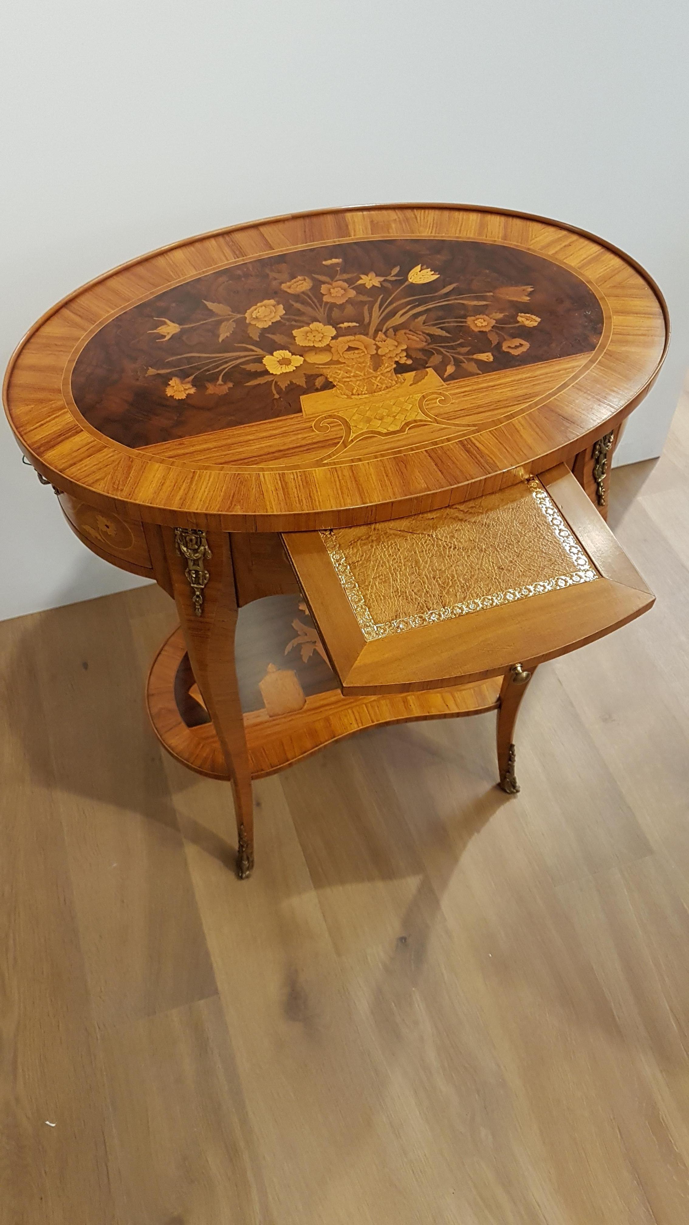 Hand-Crafted Oval table in Louis XVI style with rich inlay in rosewood and bronzes  1950s For Sale