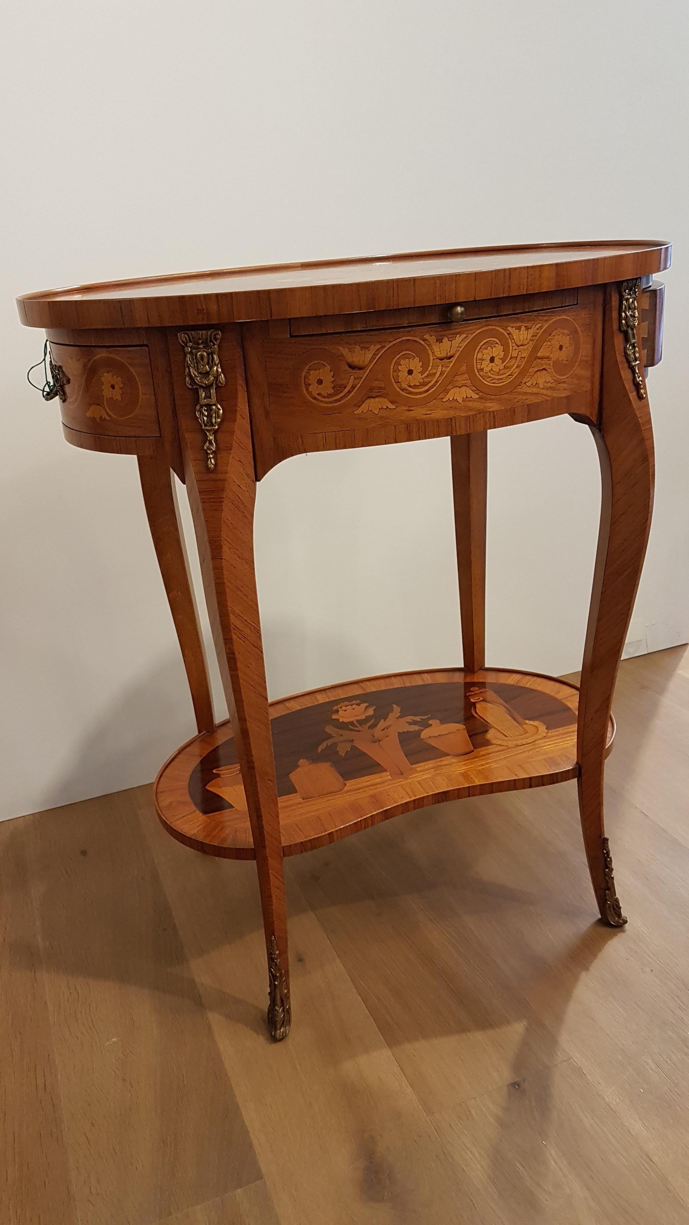 Rosewood Oval table in Louis XVI style with rich inlay in rosewood and bronzes  1950s For Sale