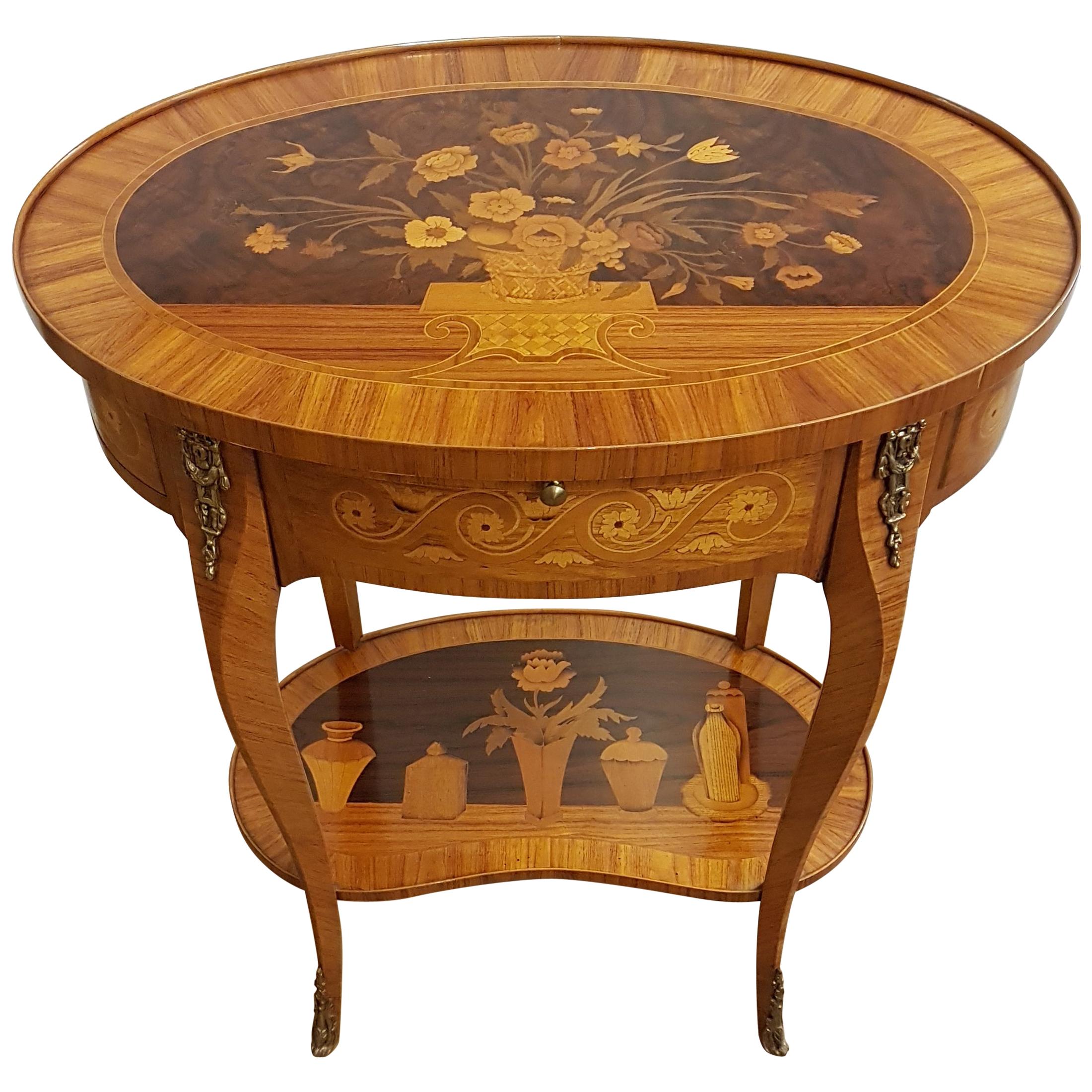 Oval table in Louis XVI style with rich inlay in rosewood and bronzes  1950s For Sale