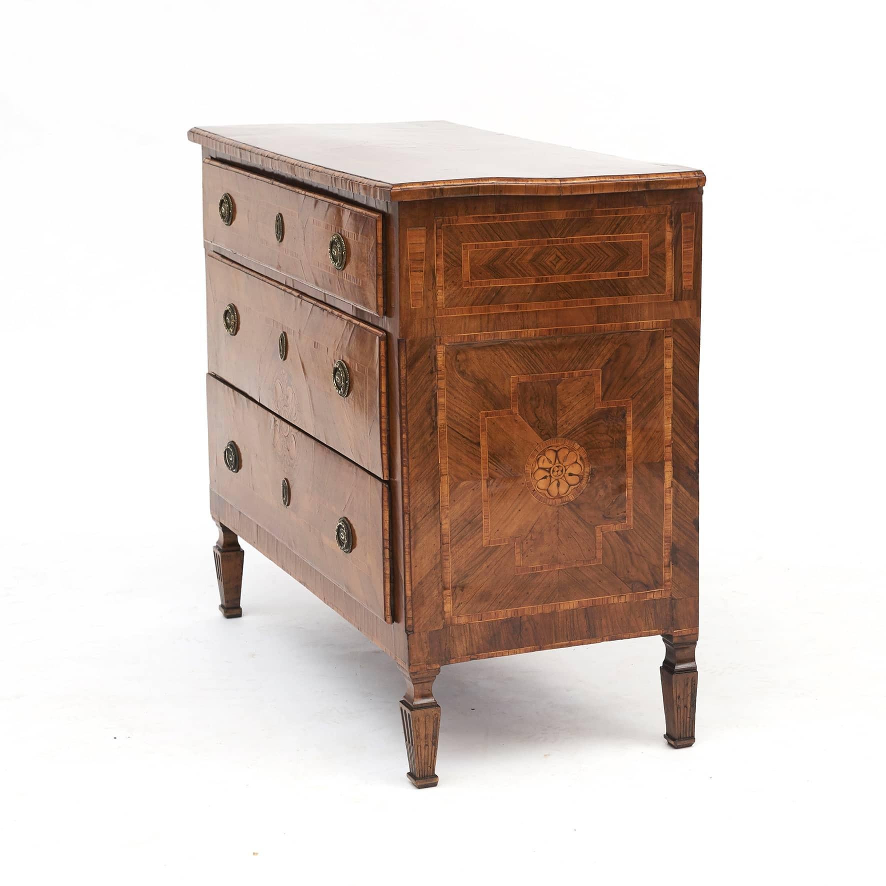 Italian Louis XVI chest of drawers from Lombardy, 1780-1790.

Three drawers. Original thick mirror-cut walnut veneer with marquetry work on top, sides and and front with stylized foliage in lemon and rosewood. Front, top and sides further with