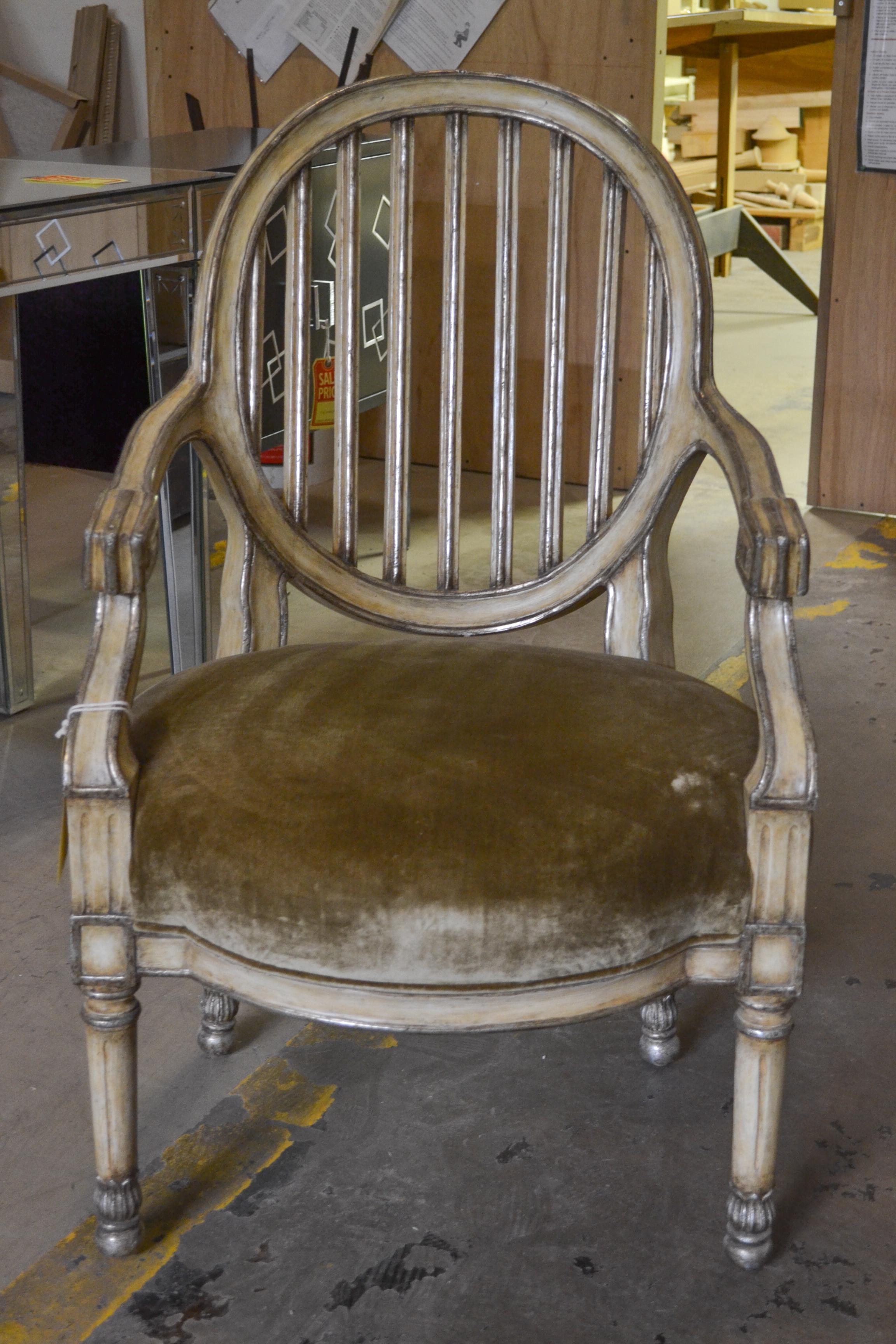 This reproduction piece comes in an antique painted finish.