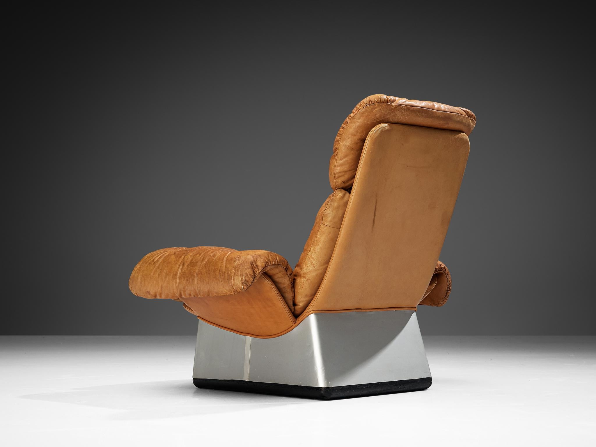 Late 20th Century Italian Lounge Chair and Ottoman in Cognac Leather For Sale