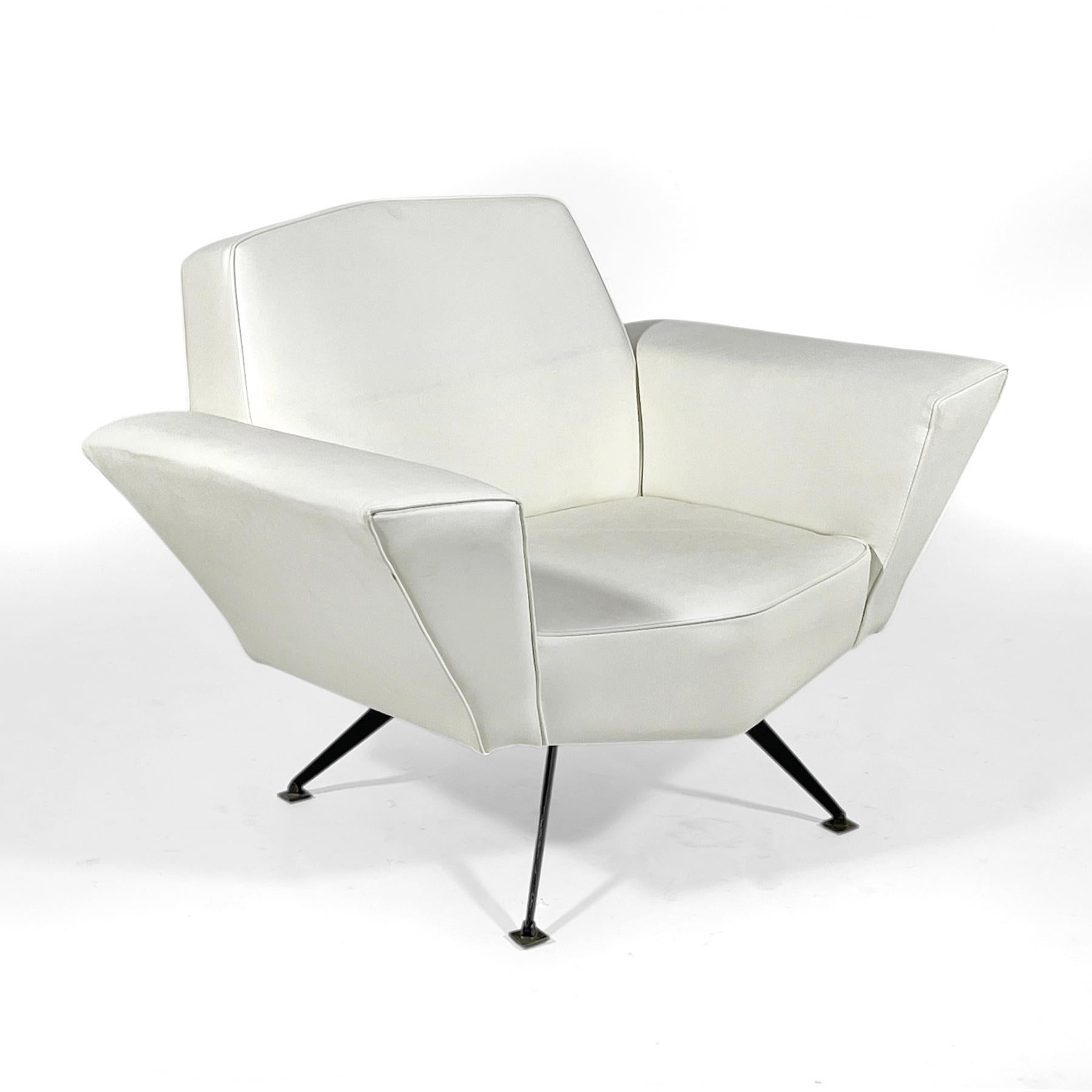This striking sofa designed by Studio Tecnico in the 1950s for Lenzi is as comfortable as it is dramatic. Splayed iron legs with pivoting brass feet support an upholstered body with generous arms and a very comfortable seat.

30.5