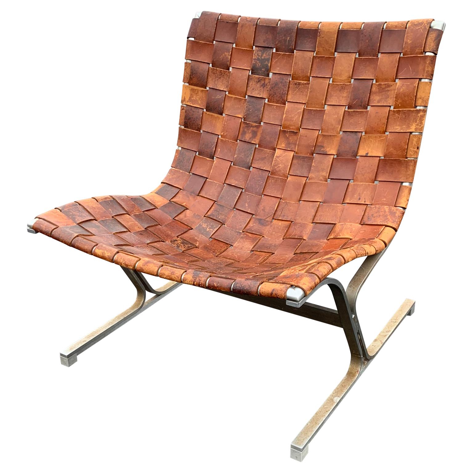 Mid-Century Modern cognac-colored leather lounge chair by Ross Littell

PLR 1 woven leather chair with amazing vintage cognac colored patina and brushed steel for ICF, Milan. Made in Italy, circa 1965.
Optional 8-12 hour Tri-State & DC snap