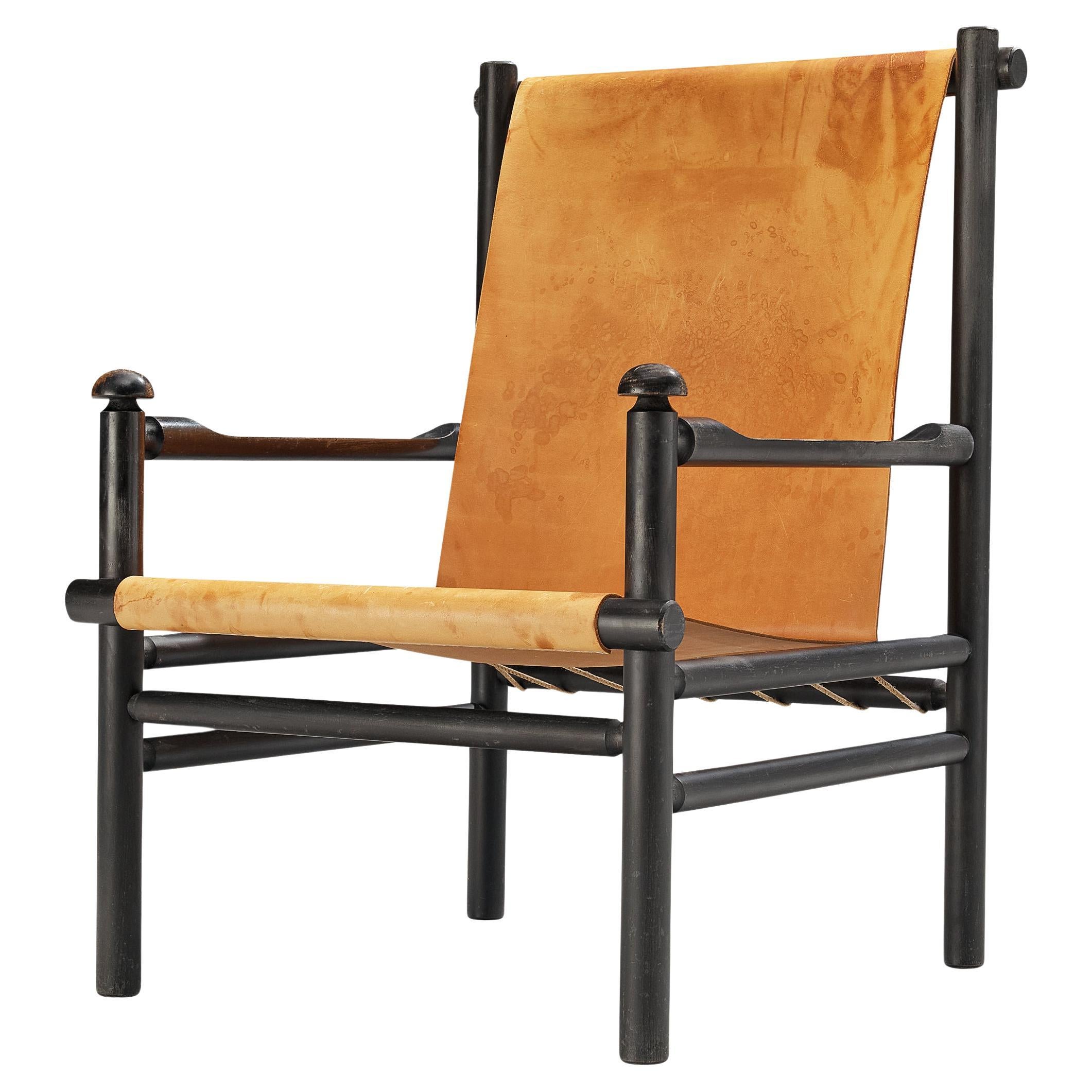 Italian Lounge Chair in Patinated Cognac Leather  For Sale