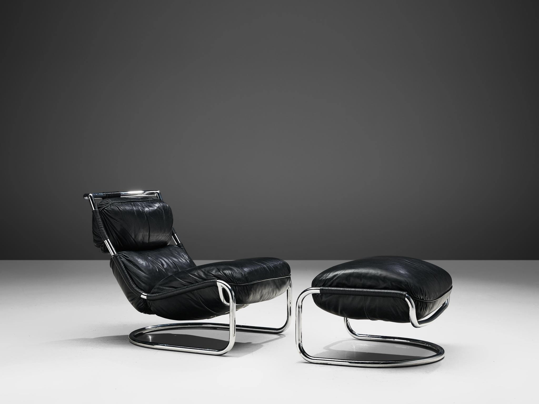 Lounge chair with ottoman, leather and chromed steel, Italy, 1970s

A tubular slipper chair with ottoman; functional and light thanks to the combination of strong, lasting materials. Bended tubular steel with black leather. Beautiful curved and