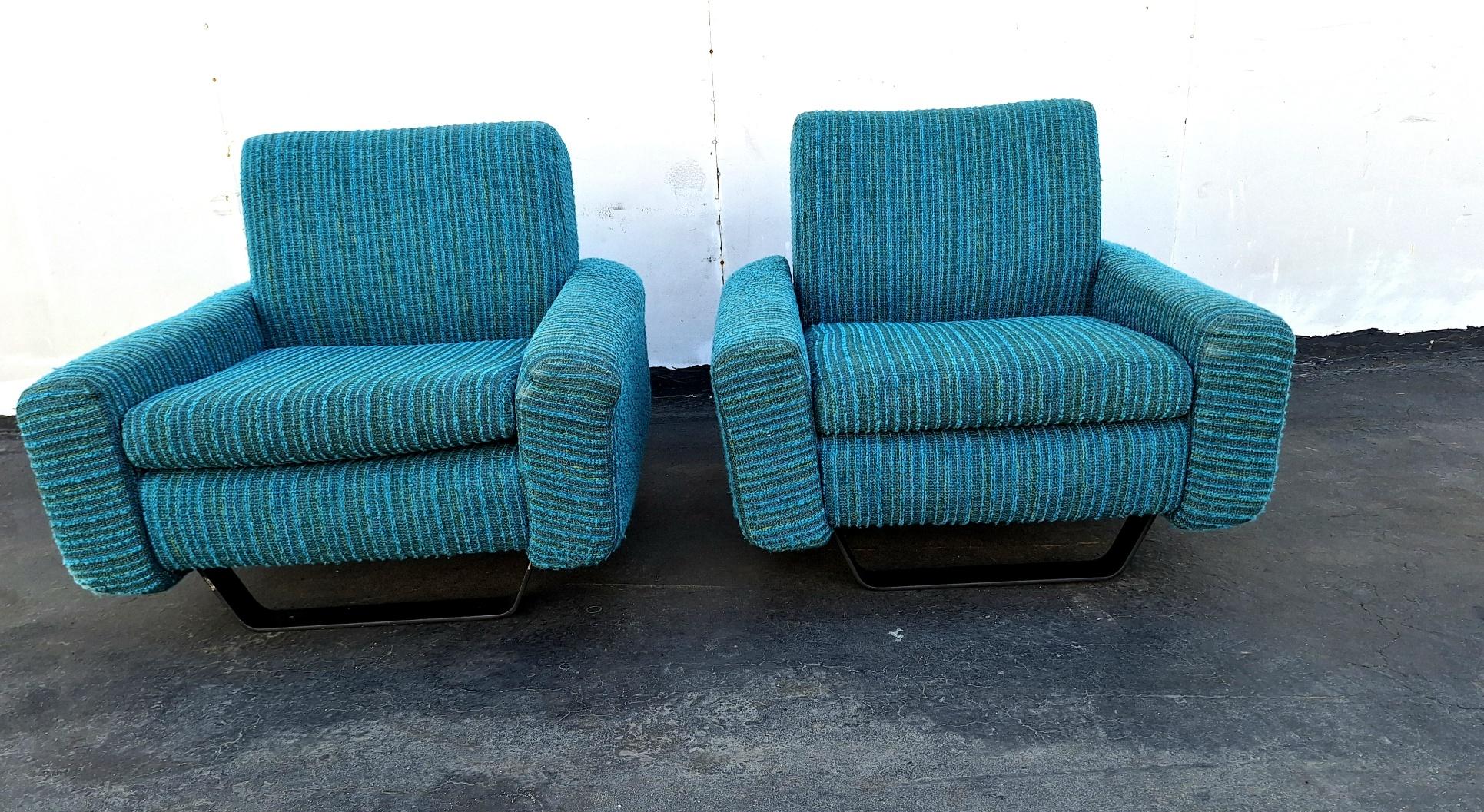 Mid-century Italian lounge chairs with metal legs and original boucle upholstery are cherished pieces of furniture that offer a blend of historical significance, aesthetic appeal, and practical comfort. Their condition and originality make them