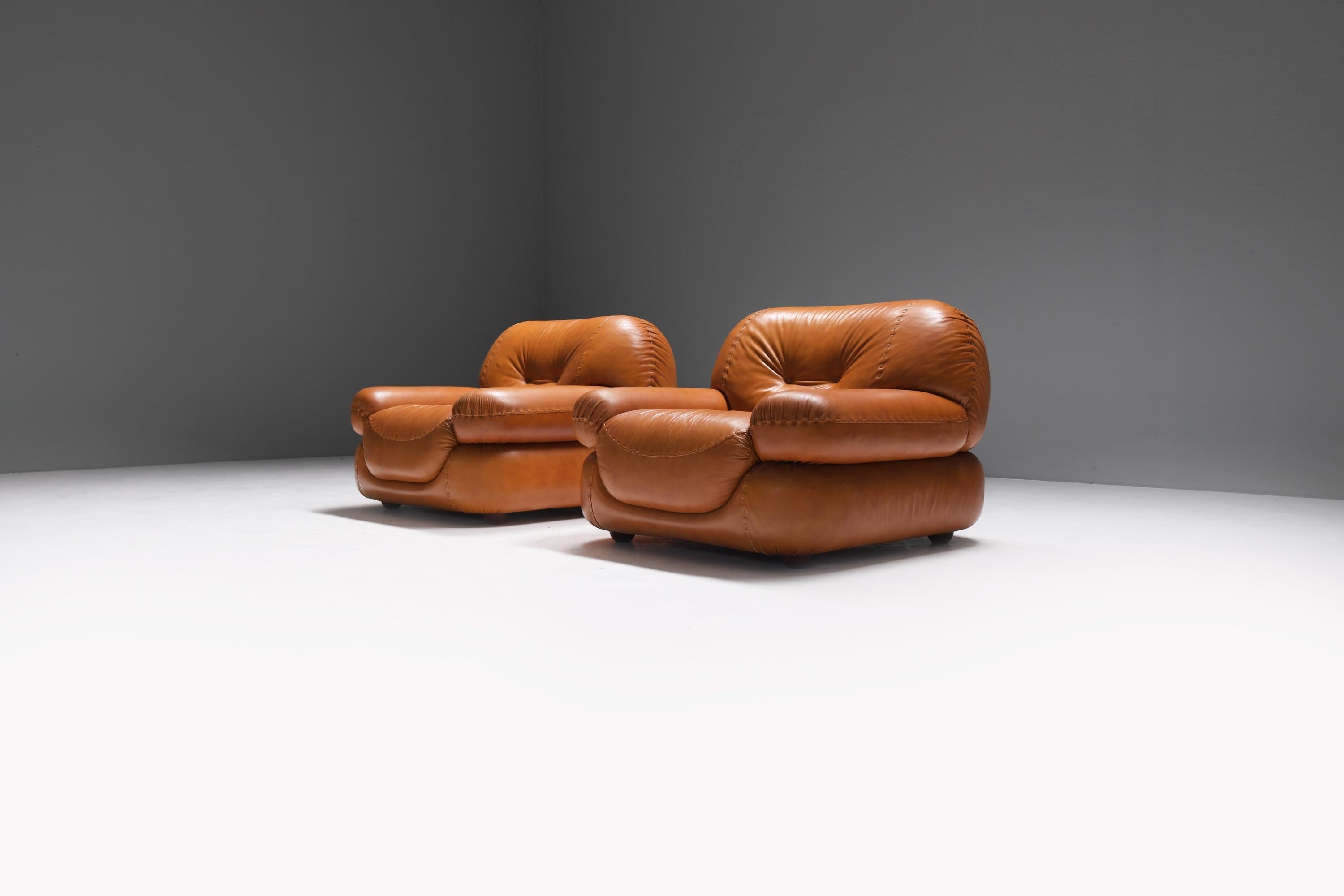 Stunning set of  big, fluffy Italian lounge chairs.  Incorporating round lines and shapes into your home decor can help soften the overall look of a room and create a more inviting atmosphere. Signed.
Designed by Sapporo for Mobil Girgi in the