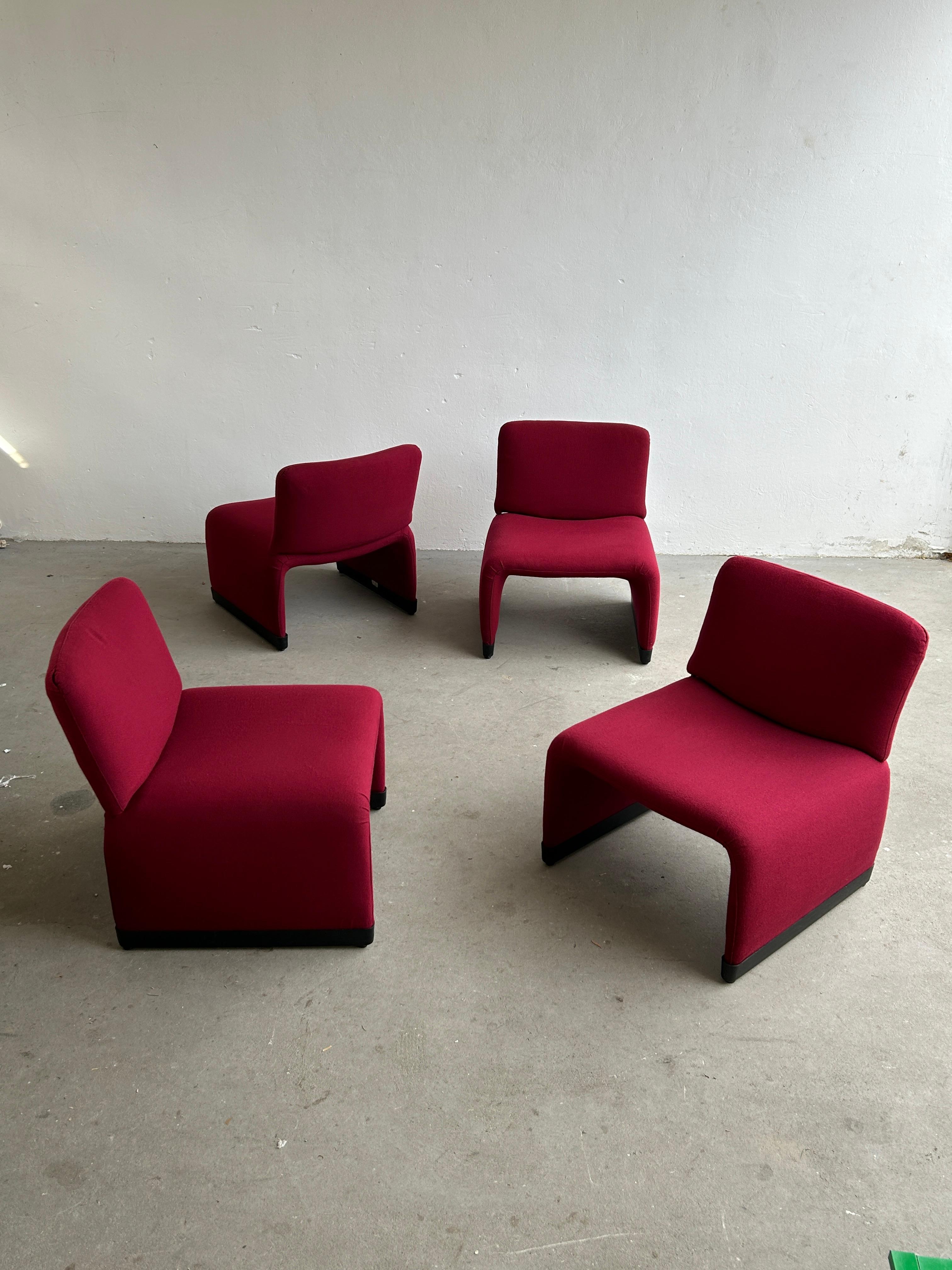 Set of four eye-catching 1970s Italian vintage lounge chairs, once a part of an Italian local bank office inventory.
The back of the chair is detachable as shown in the photographs.

Exceptionally well preserved with minimal signs of age, as
