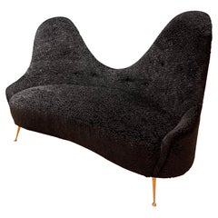 Italian love seat in black boucle fabric