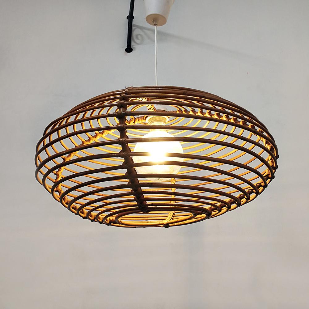 Italian lozeng shaped rattan ceiling lamp, 1960s
Bright Italian ceiling lamp dating to the 1960s, with a shape of a lozange and a unique rattan structure, perfectly maintained and completely revised in the electric cablage. Versatile presence,