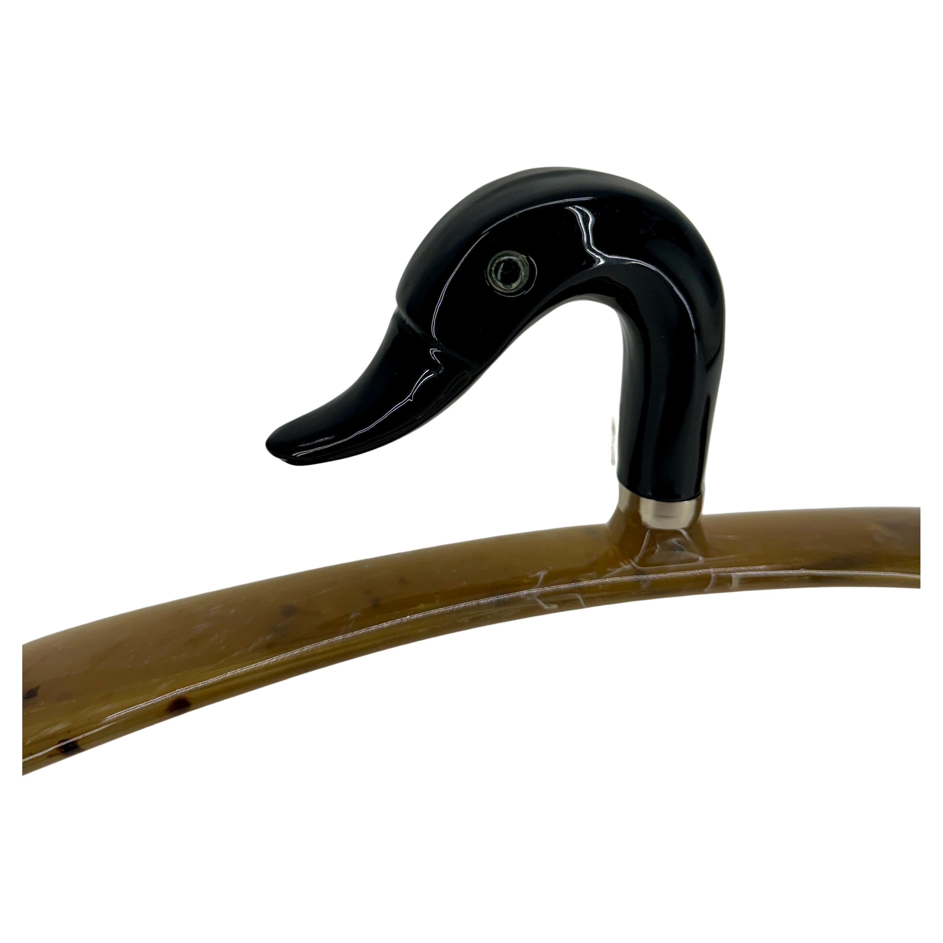 Lucite Clothes Hanger Featuring a Duck, Italy

Crafted in Italy, this heavy-duty acrylic hanger features a beautiful amber lucite resin finish. Both form and function, this duck certainly would add a touch of elegance and is suitable for coats,