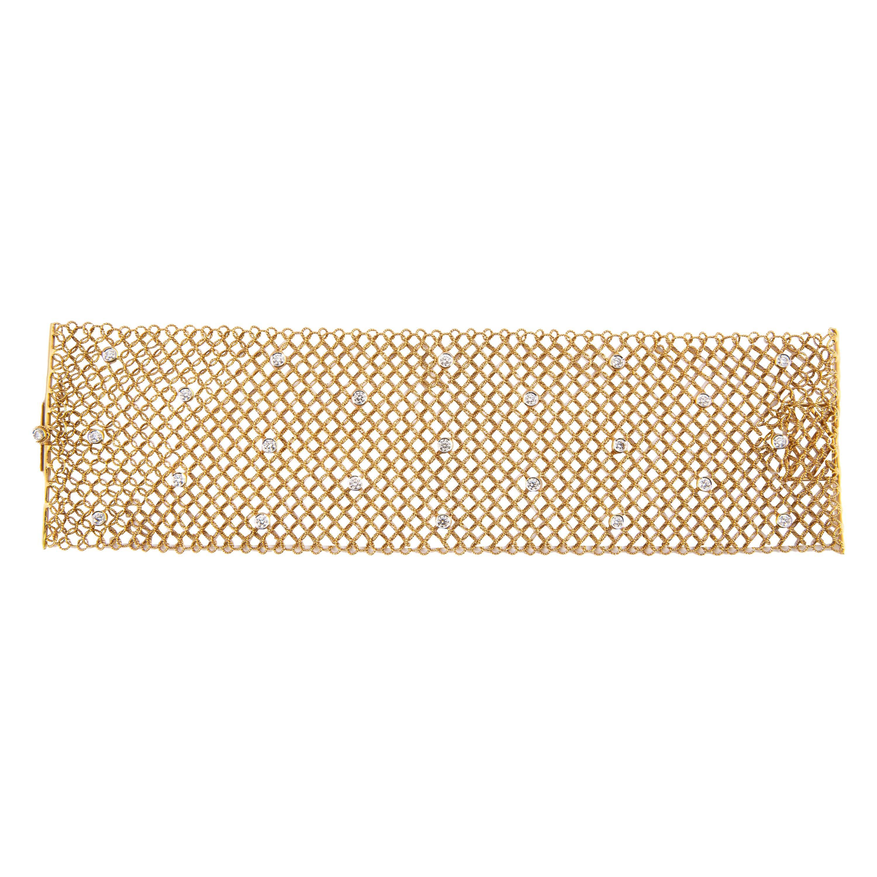 Stunning Italian made yellow gold and diamond lace bracelet.
24 round brilliant diamonds, 2.40 carats, G/H color and VS clarity. 18k yellow gold, 47 grams, 7 inches.
Accommodated with an up-to-date appraisal by a GIA G.G. once purchased, upon