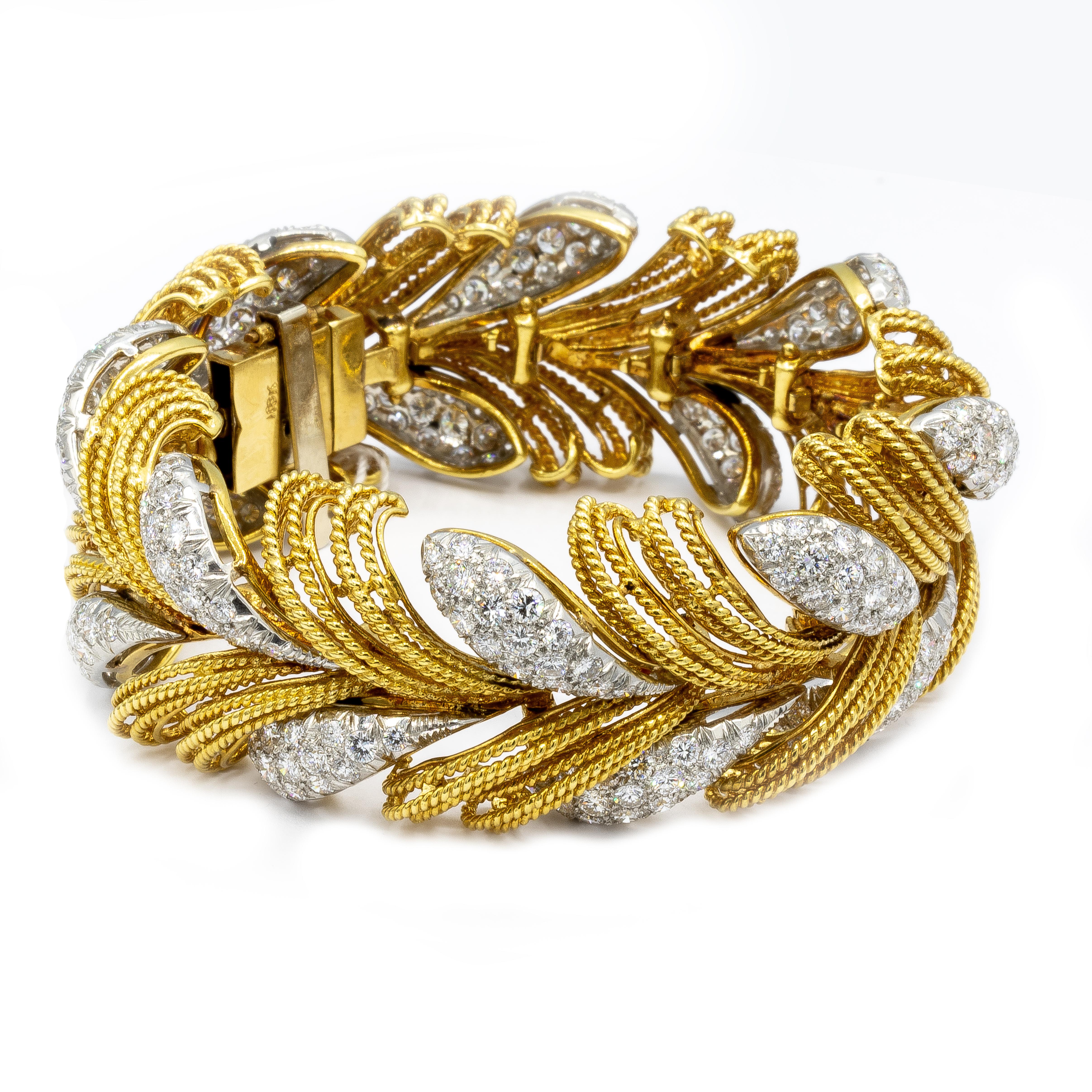 This beautiful piece depicts a branch full of leaves in radiant 18K yellow and white gold, and 8 carats of beautiful F color diamonds. This bracelet will always be a great addition that you're looking for. 
Diamonds = 8 carats
( Color: F, Clarity: