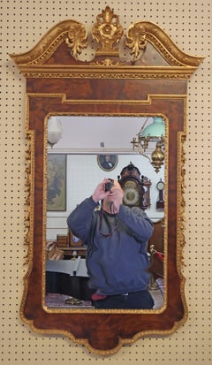 Specchio Chippendale di produzione italiana in stile Reggenza in legno di radica e vernice dorata