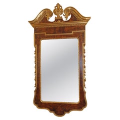 Specchio Chippendale di produzione italiana in stile Reggenza in legno di radica e vernice dorata