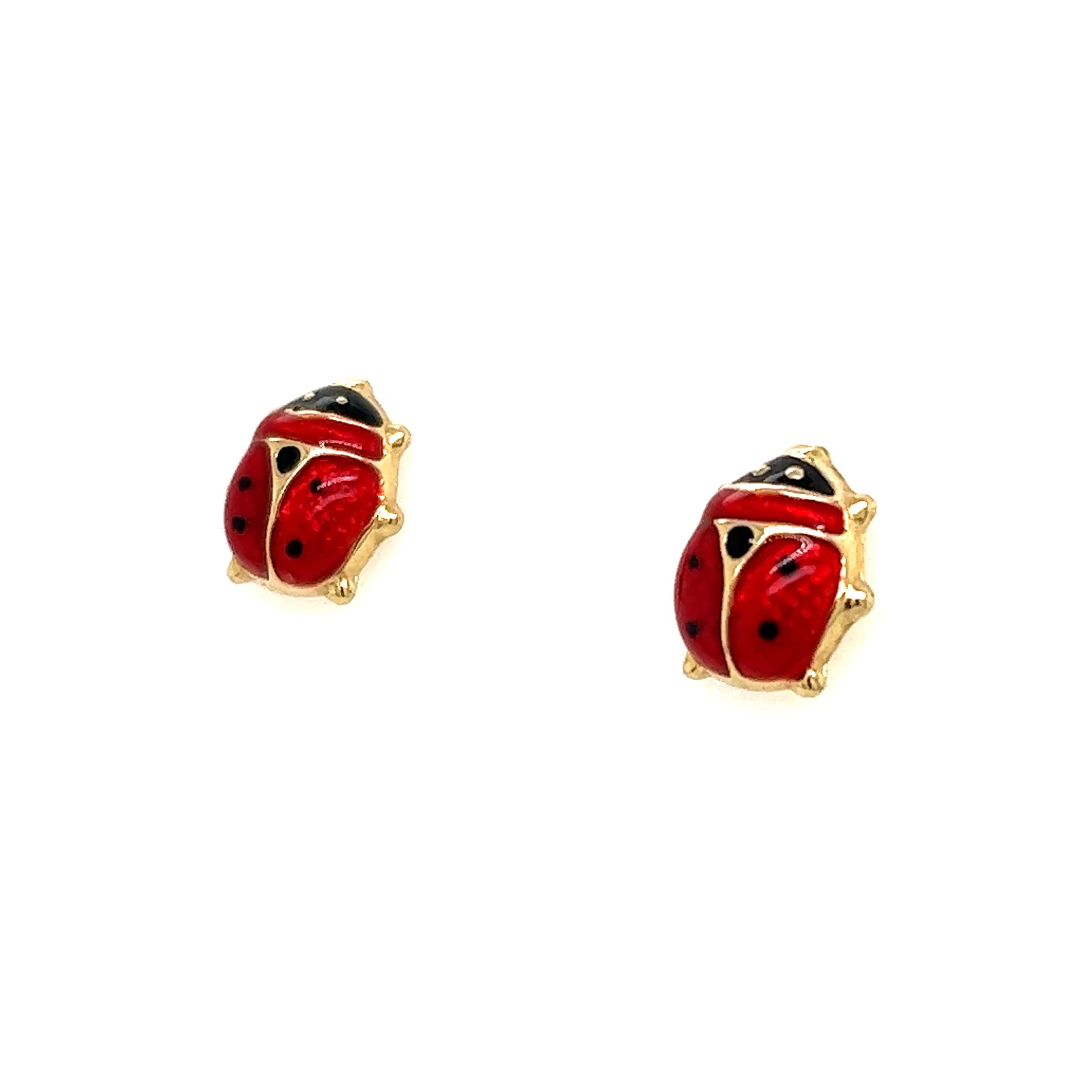 Fantastic pair of stud earrings crafted in 14k yellow gold. The pair is Italian made and details an almost life like lady bug! These earrings measure 0.40