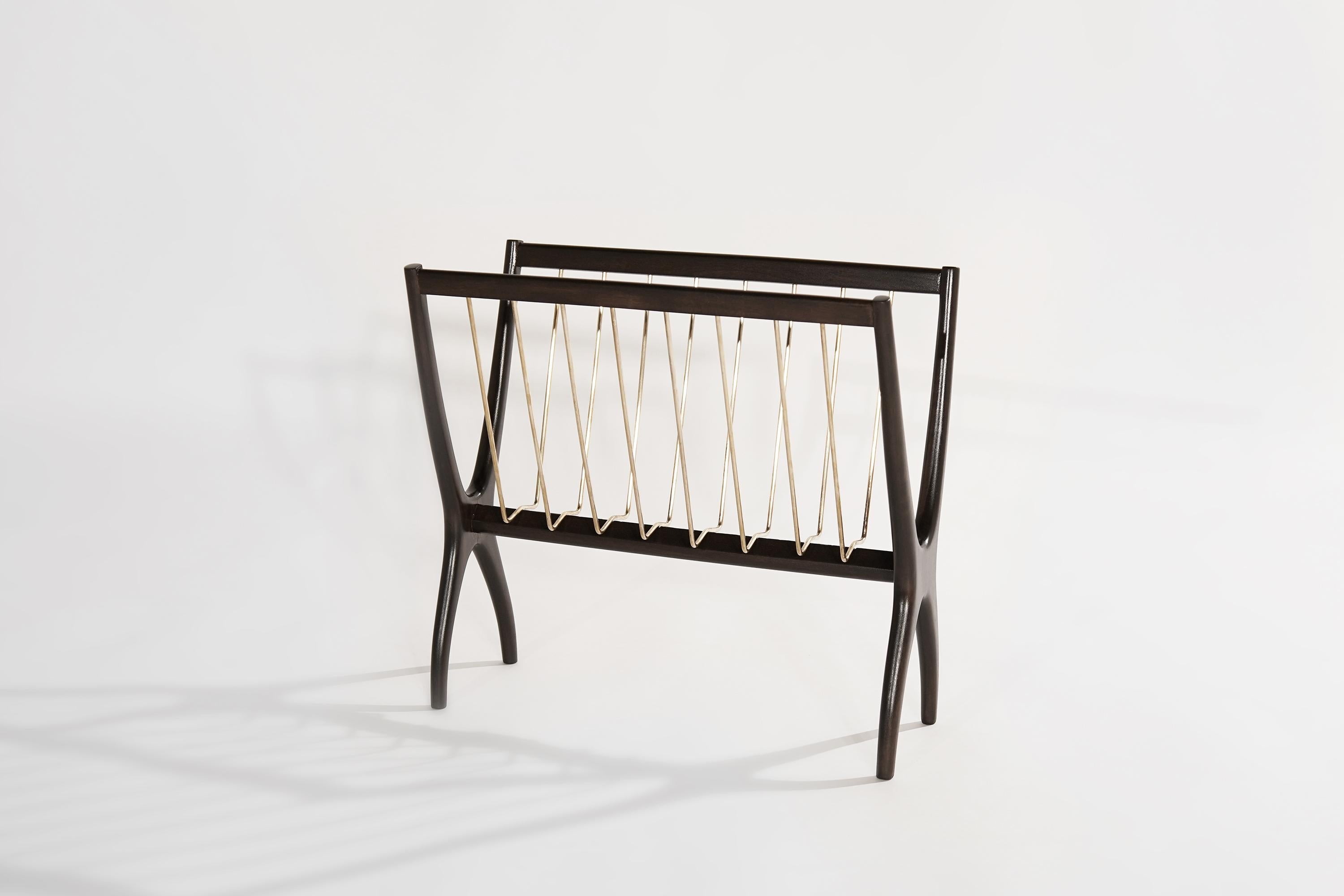 A fully restored magazine rack, original from Italy, circa 1950-1959.

Other designers working in the organic style include Carlo Mollino, Franco Campo & Carlo Graffi, Ico Parisi, and Jean Royère.