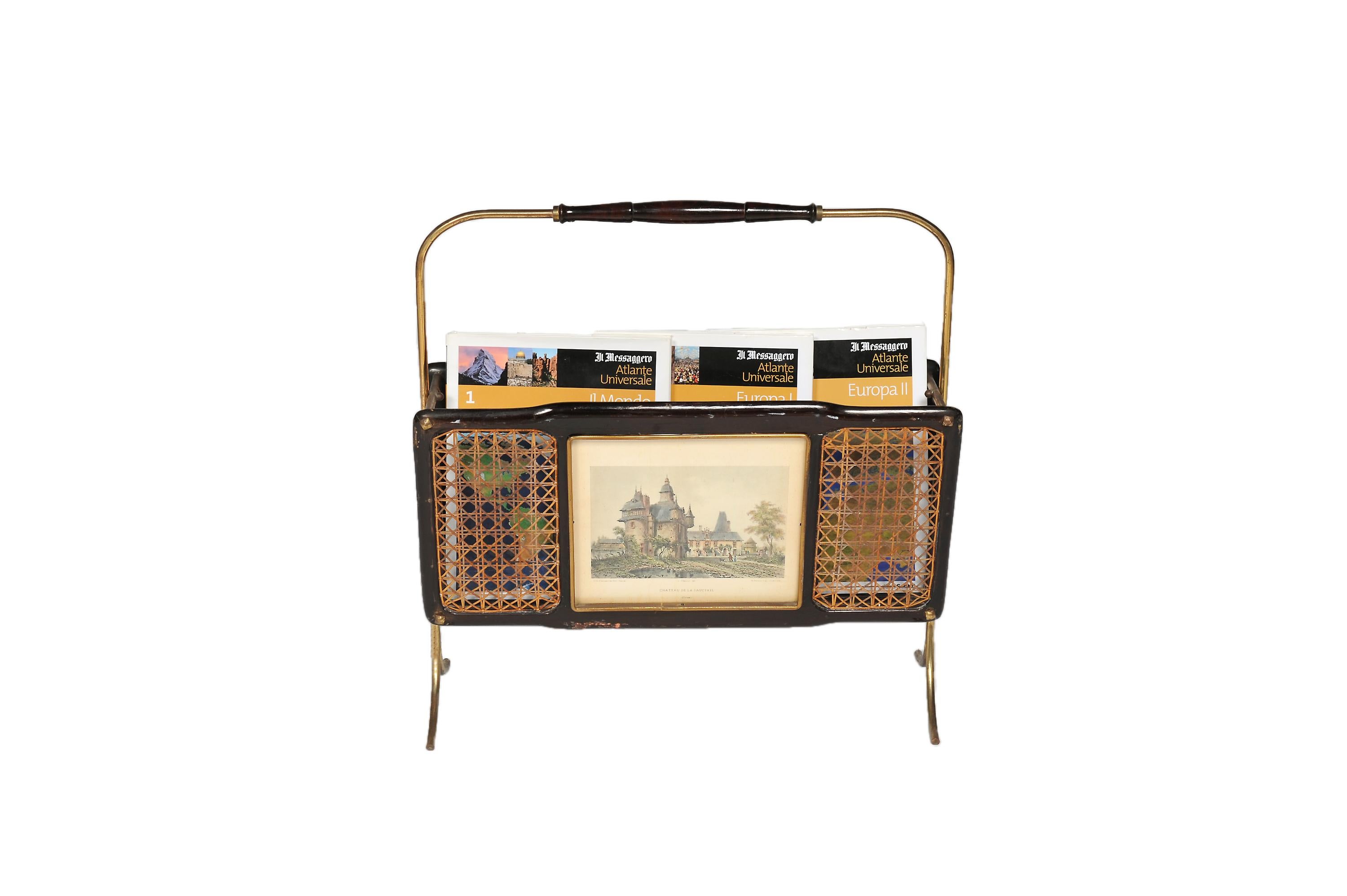 Elegant piece of the typical midcentury Italian style, a perfect union of wood, brass and wicker. Each side of the markets rank presents a colorful engraving.