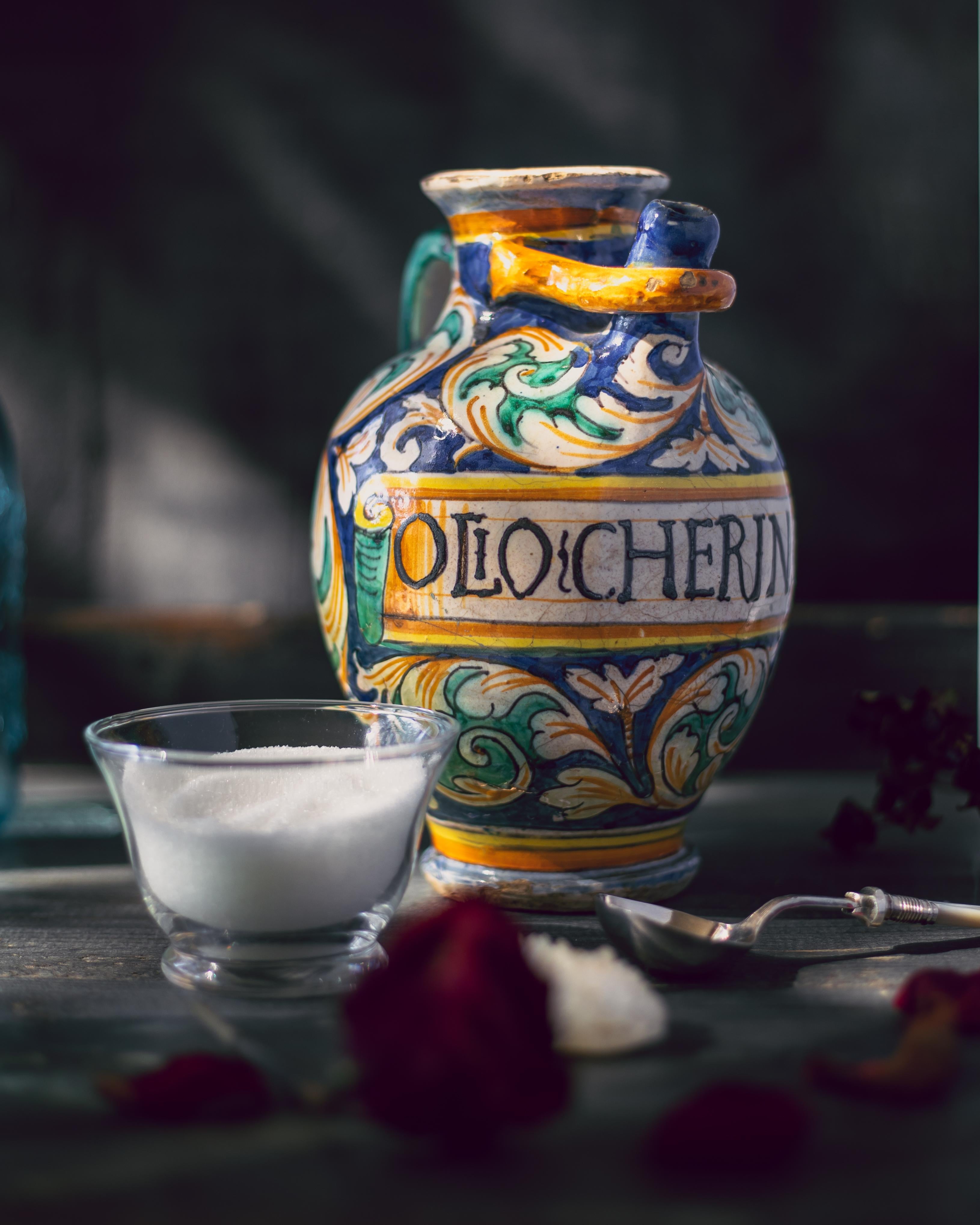 A 17th-century Italian maiolica pharmacy jar, or orciolo, with beautiful blue, green, and ochre decoration.

Throughout history, one of the main uses of ceramics was for the storage of liquids. This was particularly pertinent for apothecaries, who