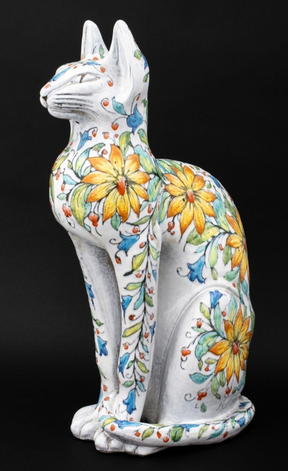 Italian Maiolica Polychrome Glazed Terracotta Seated Cat, with hand-painted floral design. 26.75