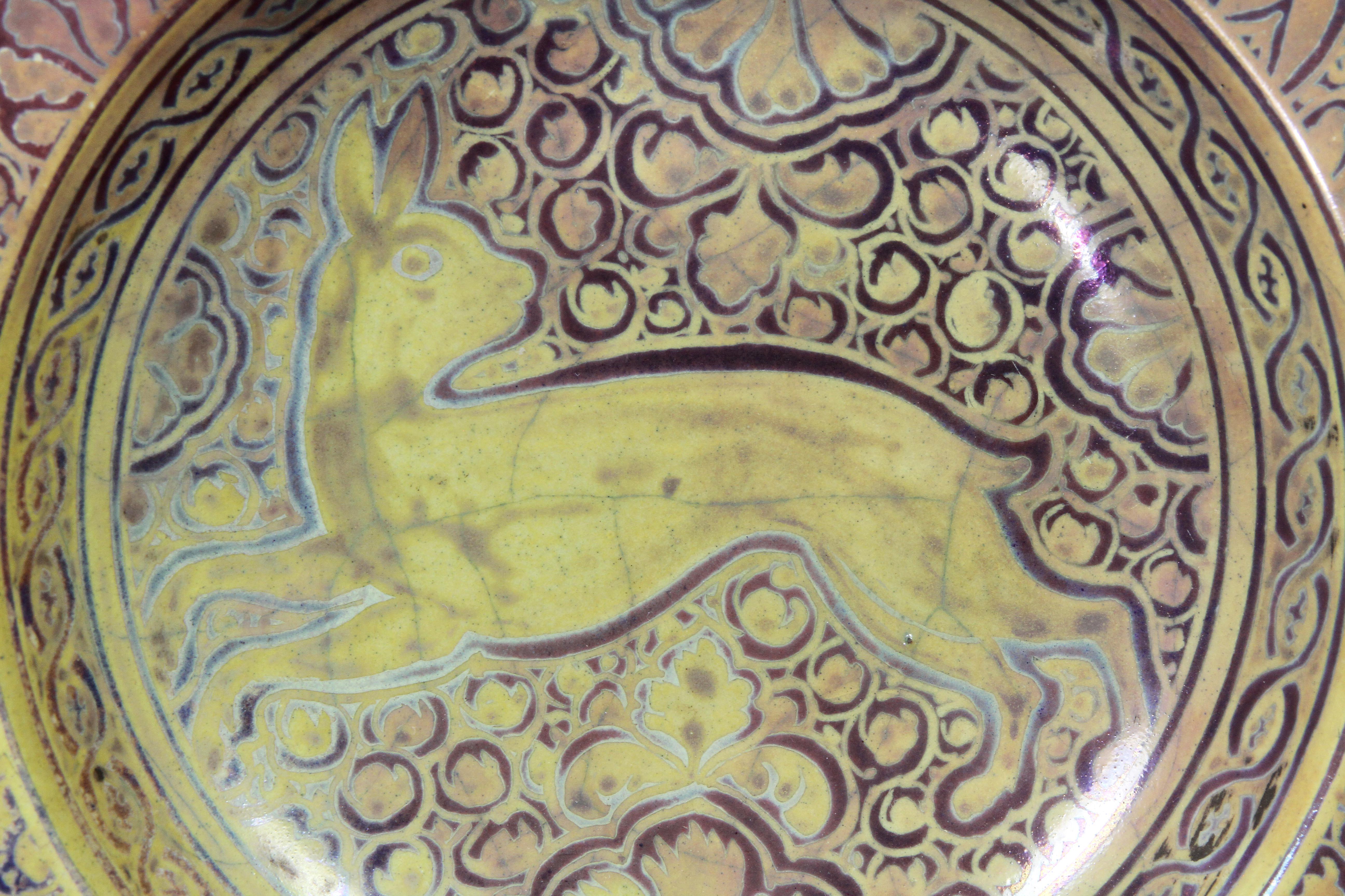 Wonderful lustre glaze with scenes of rabbits.