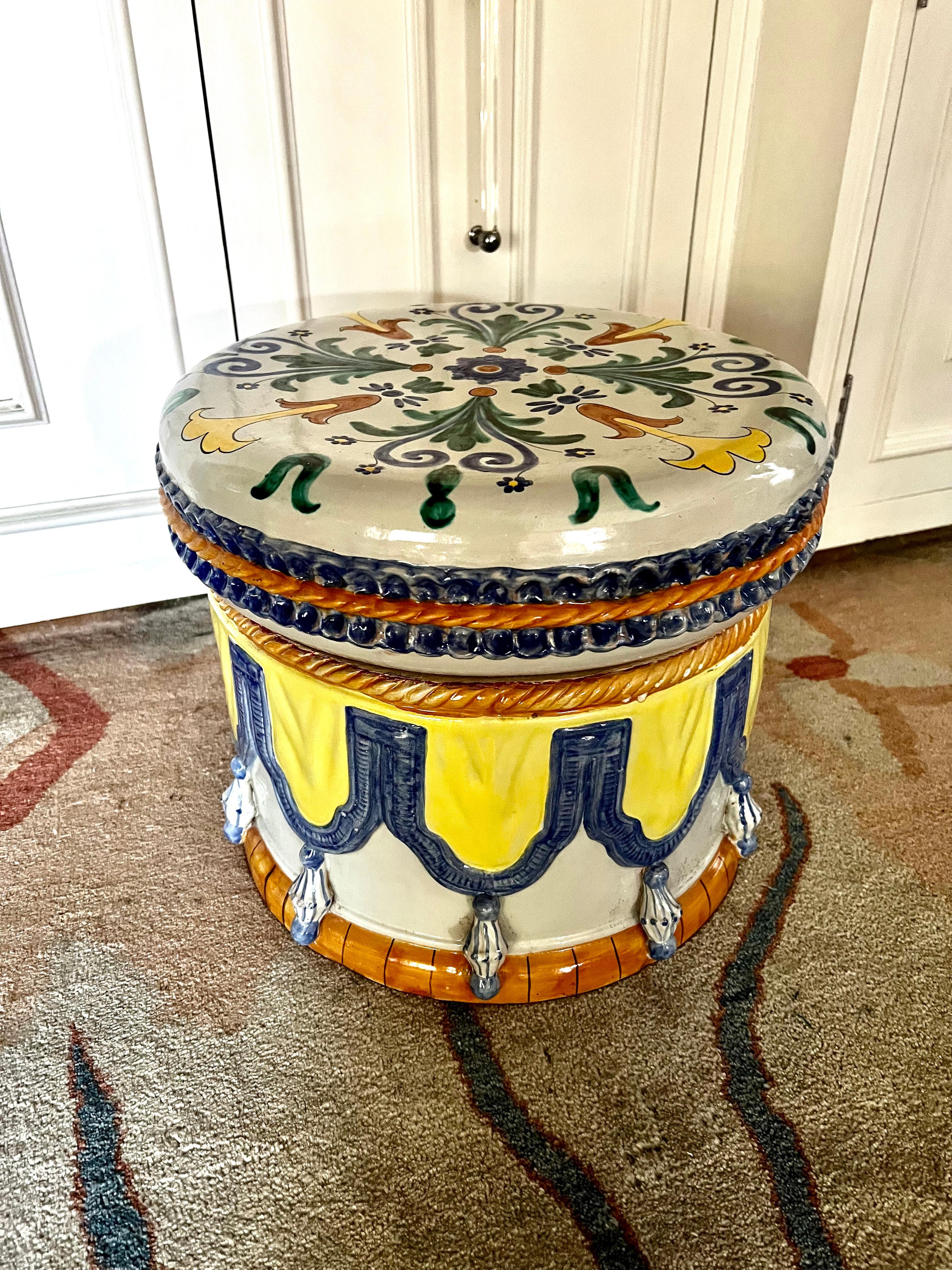 A wonderfully handcrafted garden or interior stool. Hand painted terracotta / ceramic. A compliment to many settings, especially those in the garden - a whimsical style that represents fine Italian pottery craftsmanship.

The top comes off for