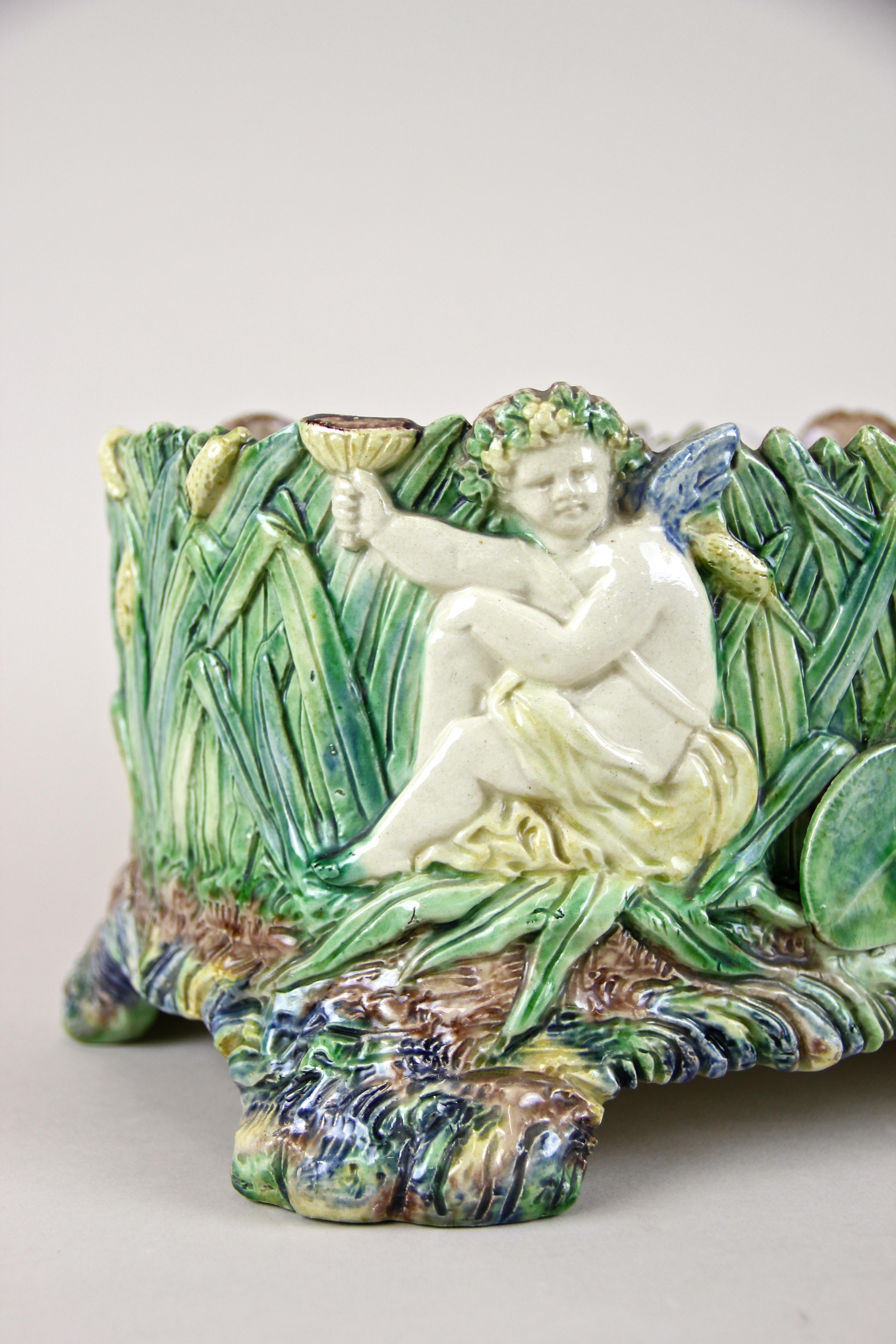 Breathtaking Italian Majolica jardinière from the early Art Nouveau period in Italy, circa 1900. This masterpiece of Majolica art comes in fantastic original untouched condition and convinces with an absolute unique look. Artfully processed in Italy