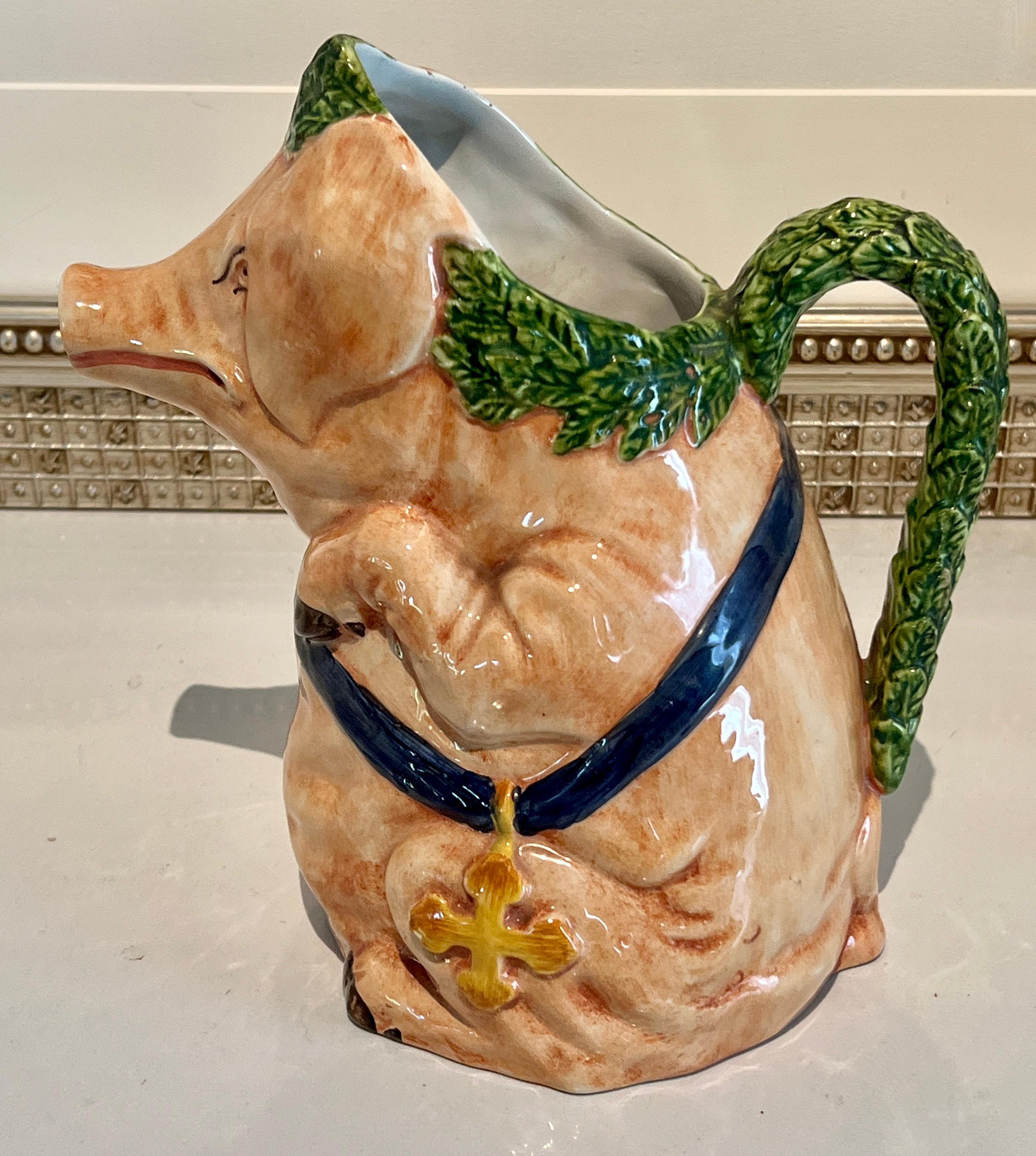 A beautifully crafted Italian Majolica Pig Pitcher.  The piece is a wonderful and warm addition to any kitchen or bar area.  While very decorative, the pitcher is also practical and holds up to over a quart of juice or gravy.

Animal themes bring a