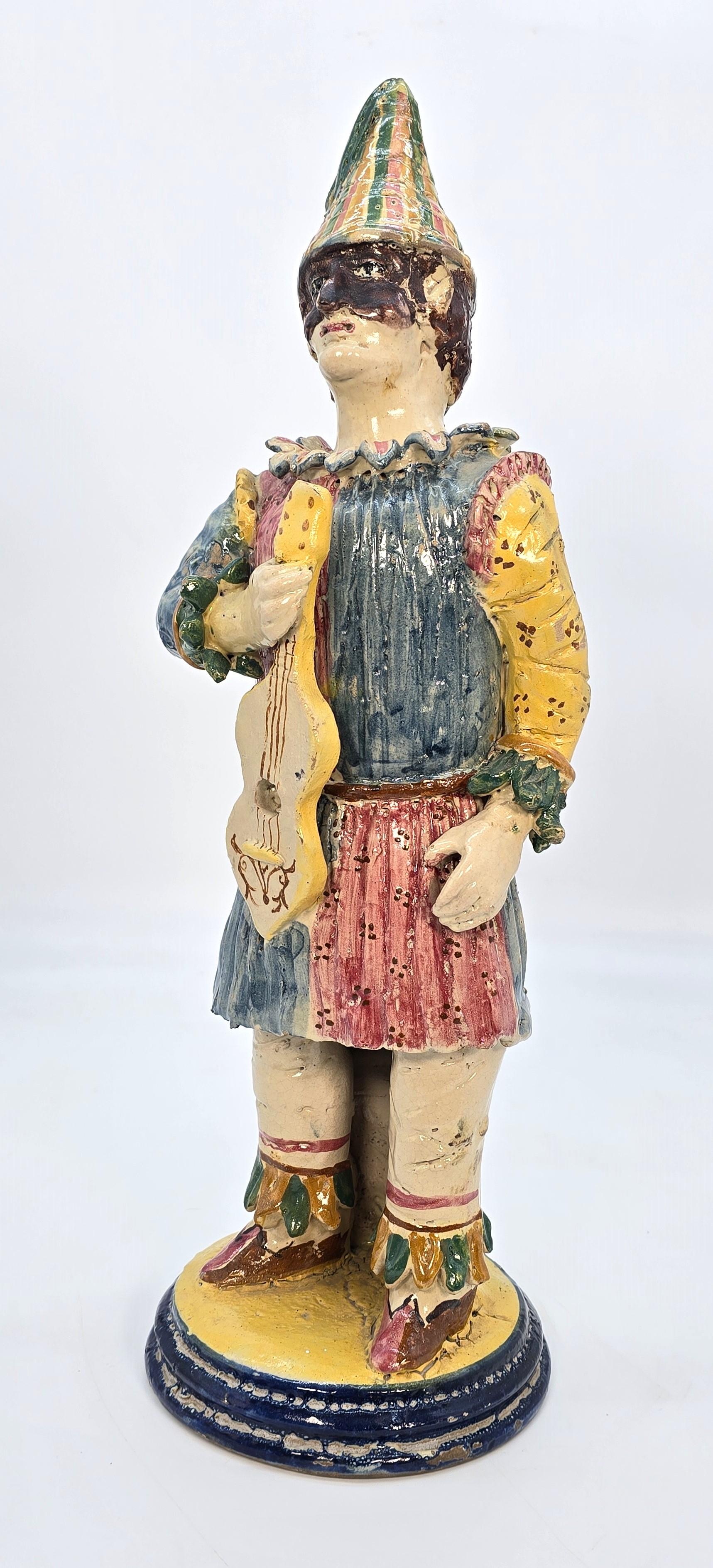 Folk Art Italian majolica pottery figure of traditional Pulcinella, hand modelled in clay For Sale
