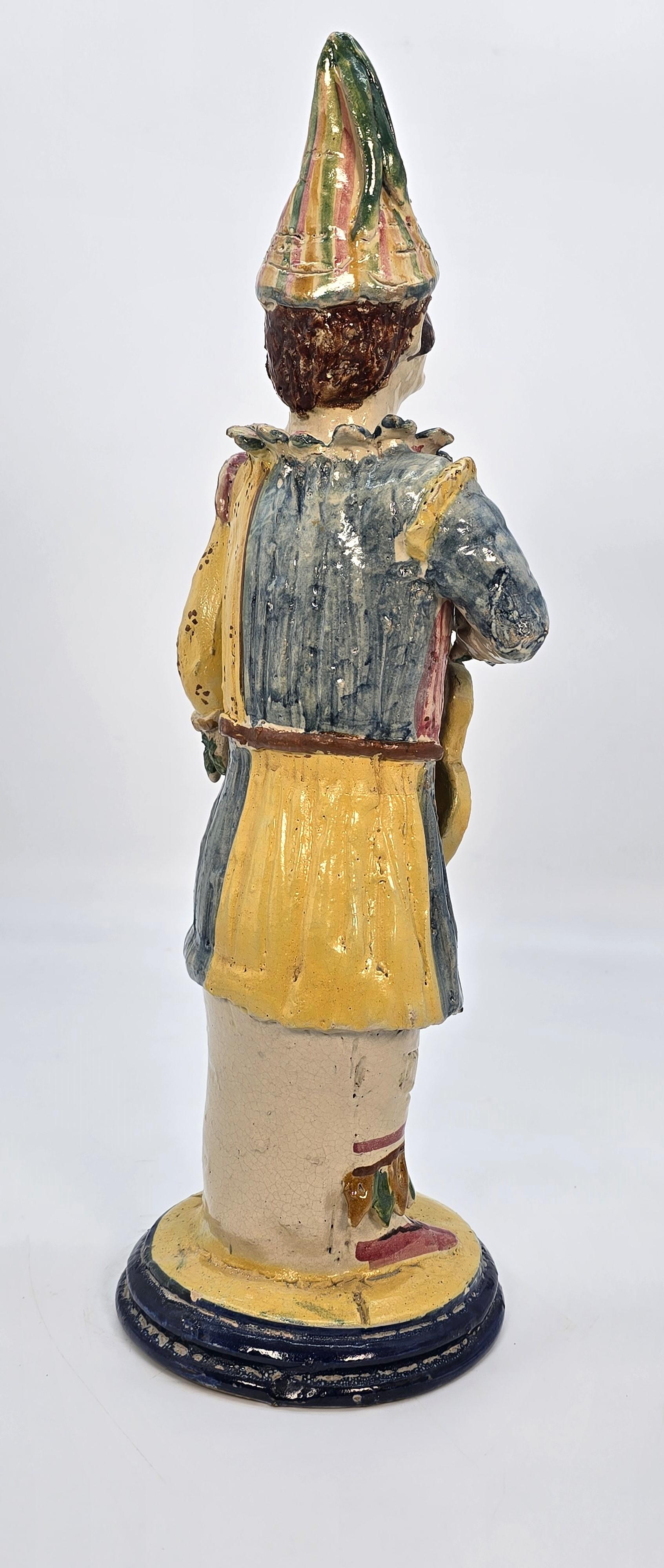 Clay Italian majolica pottery figure of traditional Pulcinella, hand modelled in clay For Sale