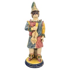 Antique Italian majolica pottery figure of traditional Pulcinella, hand modelled in clay
