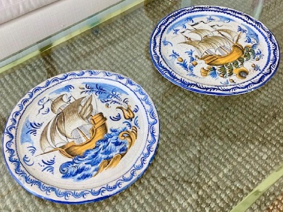 Beautiful pair of Italian majolica ship wall plates. Great vibrant colors.