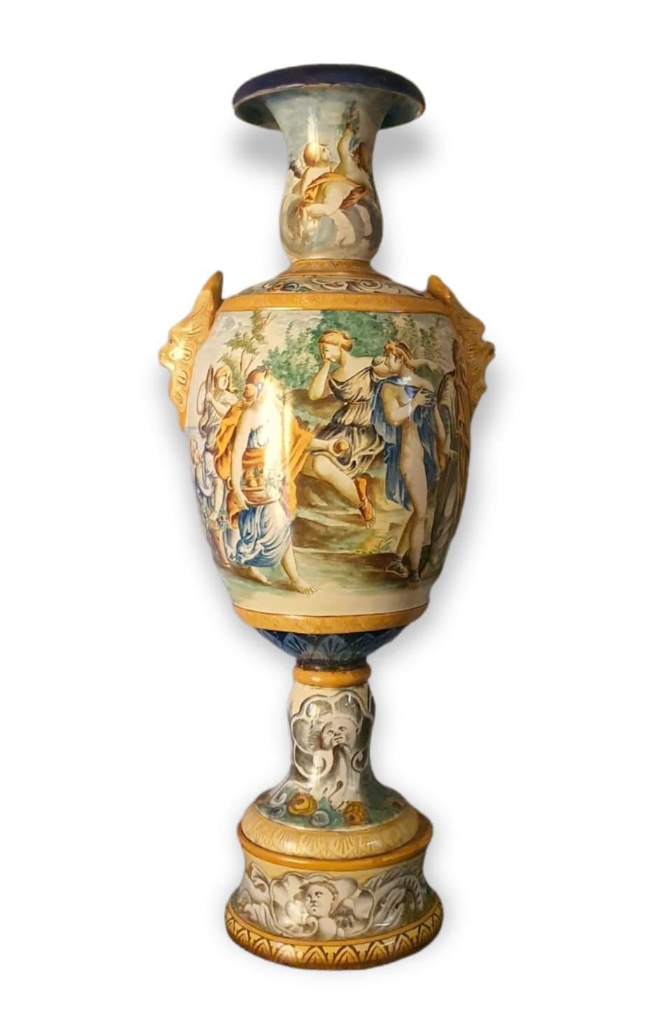 Elegant majolica vase by Castelli. Hand painted, in the round, depicting allegorical scenes.