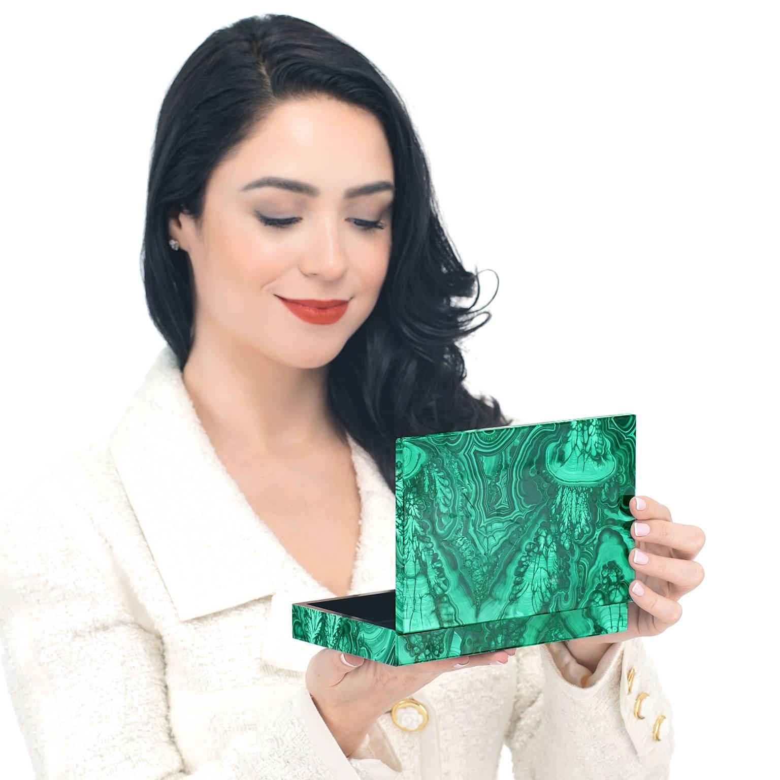 Circa 1970s, Malachite, Italy.   This fabulous Italian made hardstone box is a sleek, colorful example of seventies decorative objets. The Malachite was chosen for its particularly fine figure and vividly contrasting colors. Very good condition.