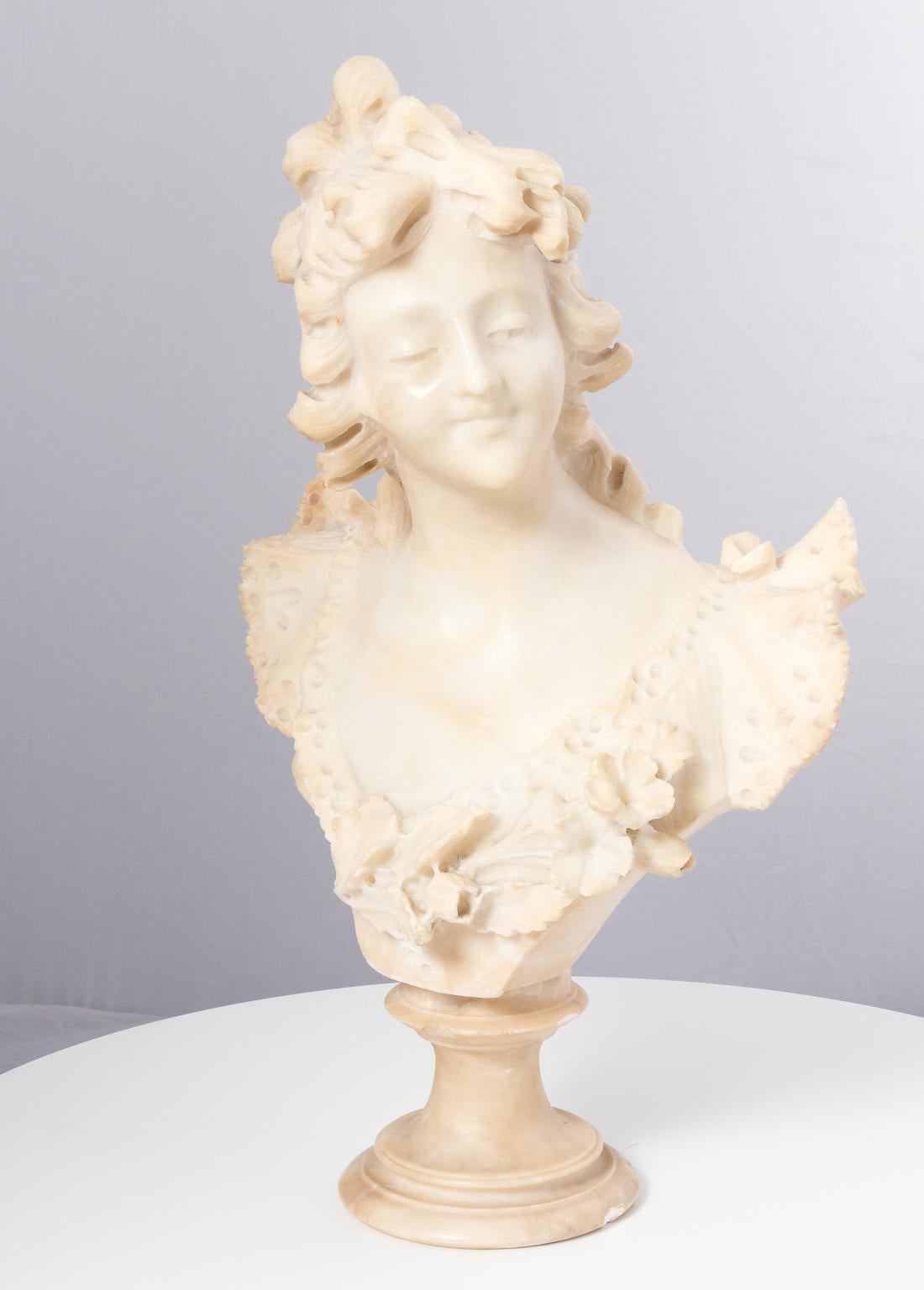 Art Nouveau bust of maiden on pedestal, circa 19th century. Flowing hair and florals. Hand carved. Outstanding quality.
 