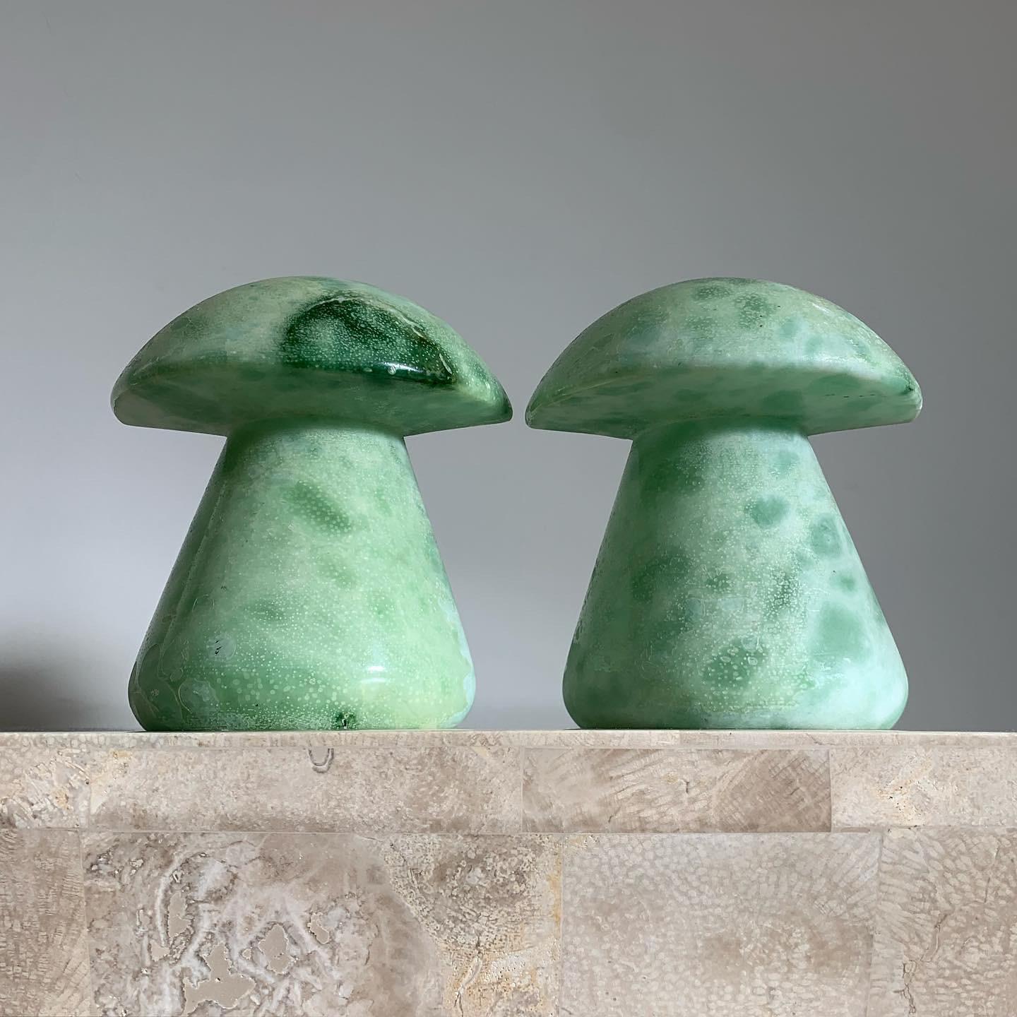 An ultra rare pair of Italian marble alabaster mushrooms in mint green / seafoam, hand-carved, 1960s. Slightly worn glaze but overall wonderful condition. Pick up in LA or worldwide shipping options available.

As one unit: 4” W x 5” D x 6” H.