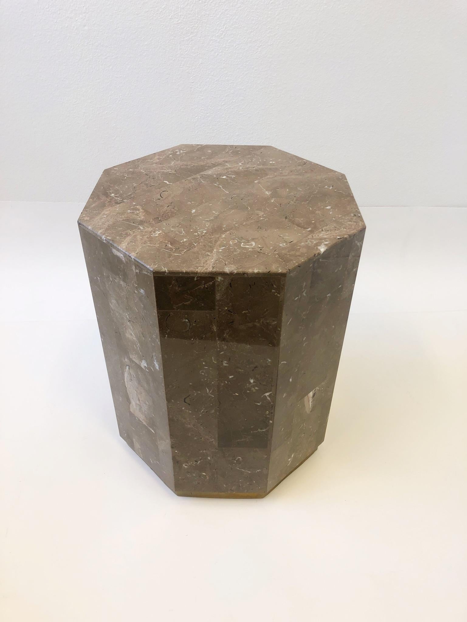 Satin brass and lite brown with white speckled Italian Marble pedestal from the 1980’s.
This can be used as a game table base if desired. 
Measurements: 25.75” high and 21.5” diameter.