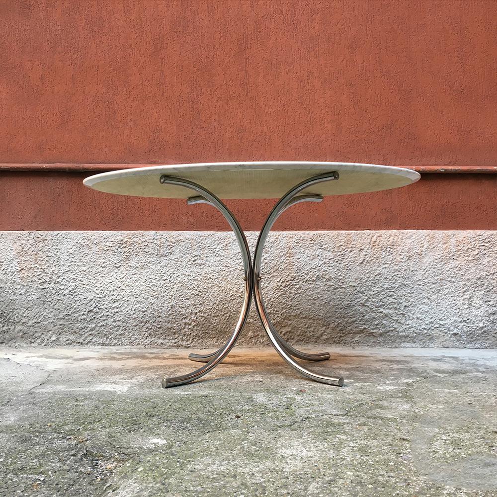Italian marble and chromed steel dining table, 1970s
Dining table with central structure in chromed steel, fully polished marble top and beveled edge
Perfect conditions.