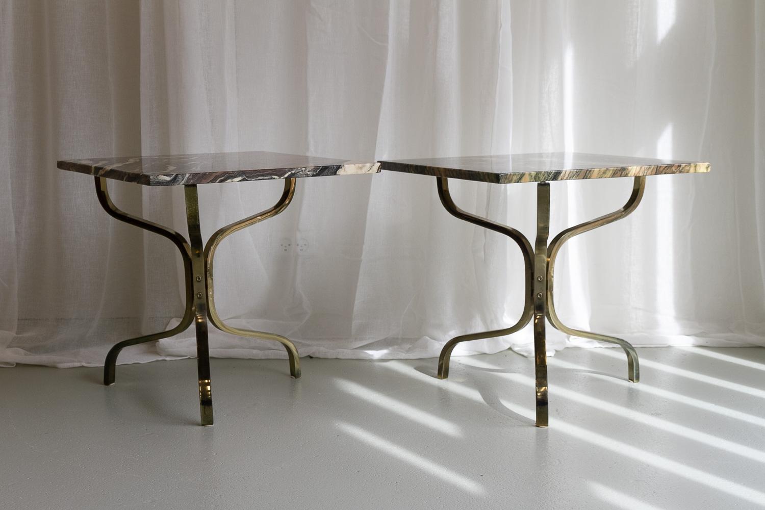 Italian Marble and Gold Side Tables, 1980s. Set of 2.  
Pair of three-legged sidetables with thick and heavy marble tops. Frame in brass coated steel. 
Suitable as coffee tables, end tables, lamp or flower tables.
Good vintage condition with patina