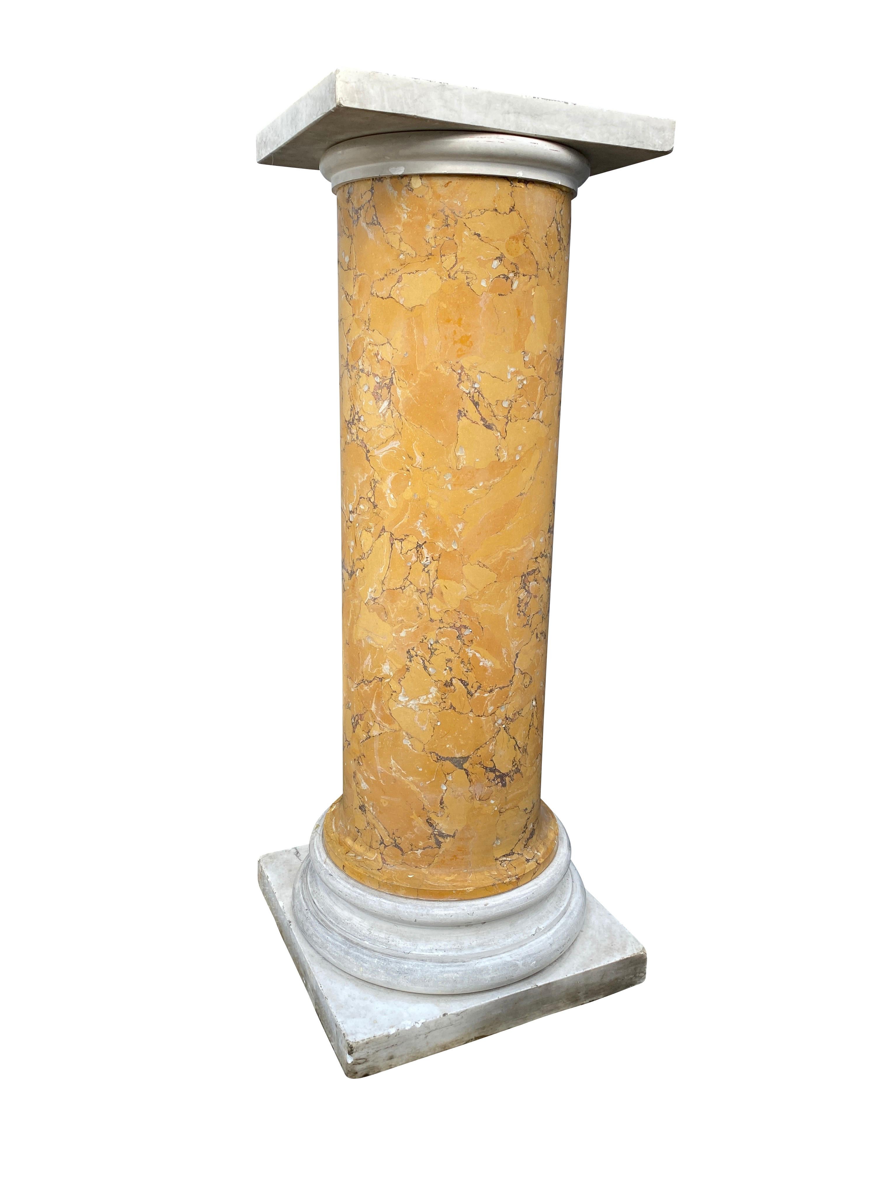 With square marble top over a Siena columnar support and a marble base.