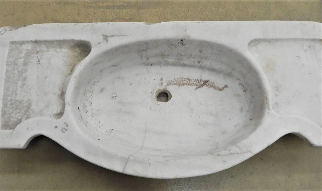 Antique marble sink made from one solid piece in natural distressed condition
Giving great characteristics.