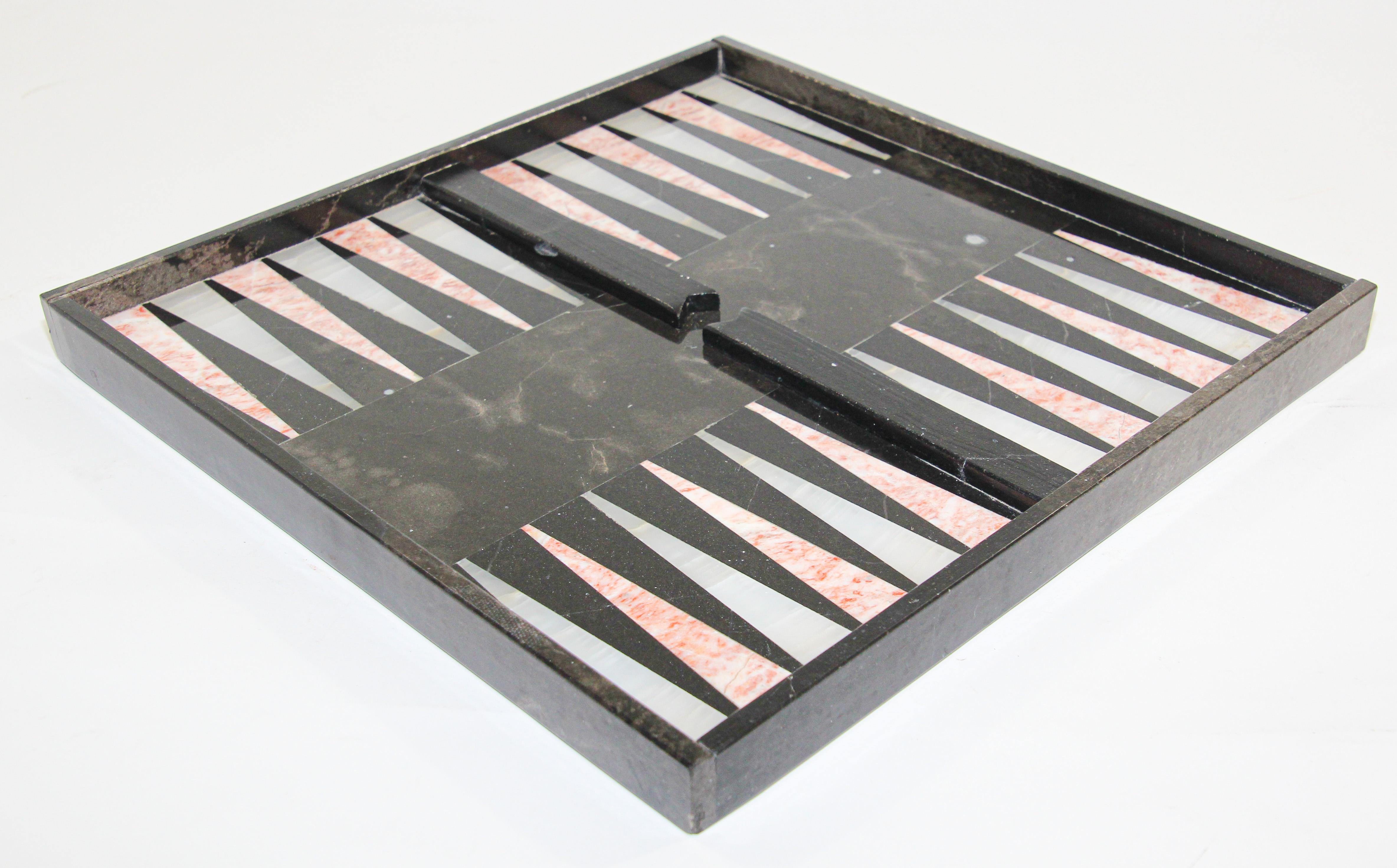 Italian marble backgammon and chess board game, 1960s
Play this beloved centuries old games in style!
An Italian vintage marble backgammon in one side and chess board in the other side
inlay with onyx.
Italy, circa 1960 gorgeous black, rose and
