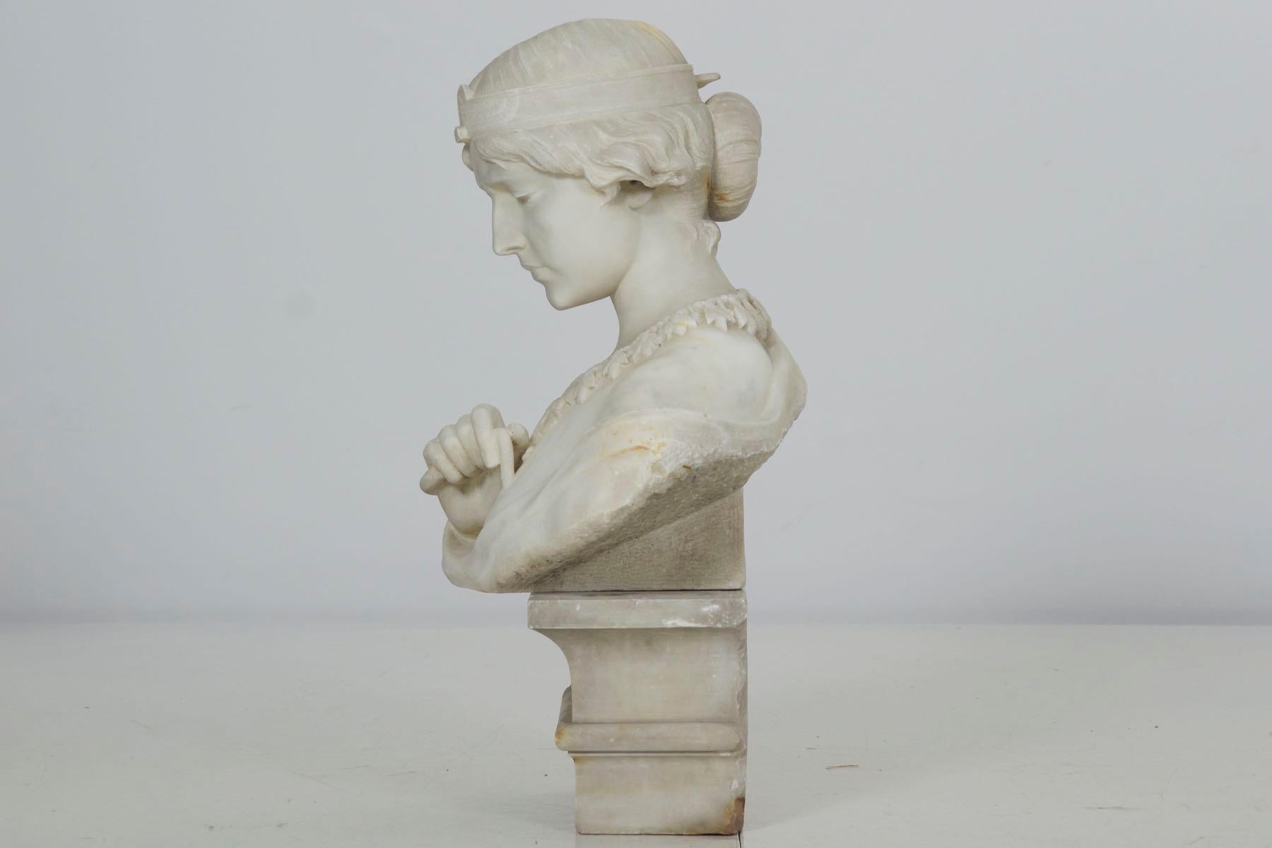 A very powerful bust capturing the fate of Cleopatra, where she committed suicide by allowing an Egyptian cobra to bite and poison her. At 39 years old, her death was a culmination of her failed alliance with her husband Mark Antony against Octavian