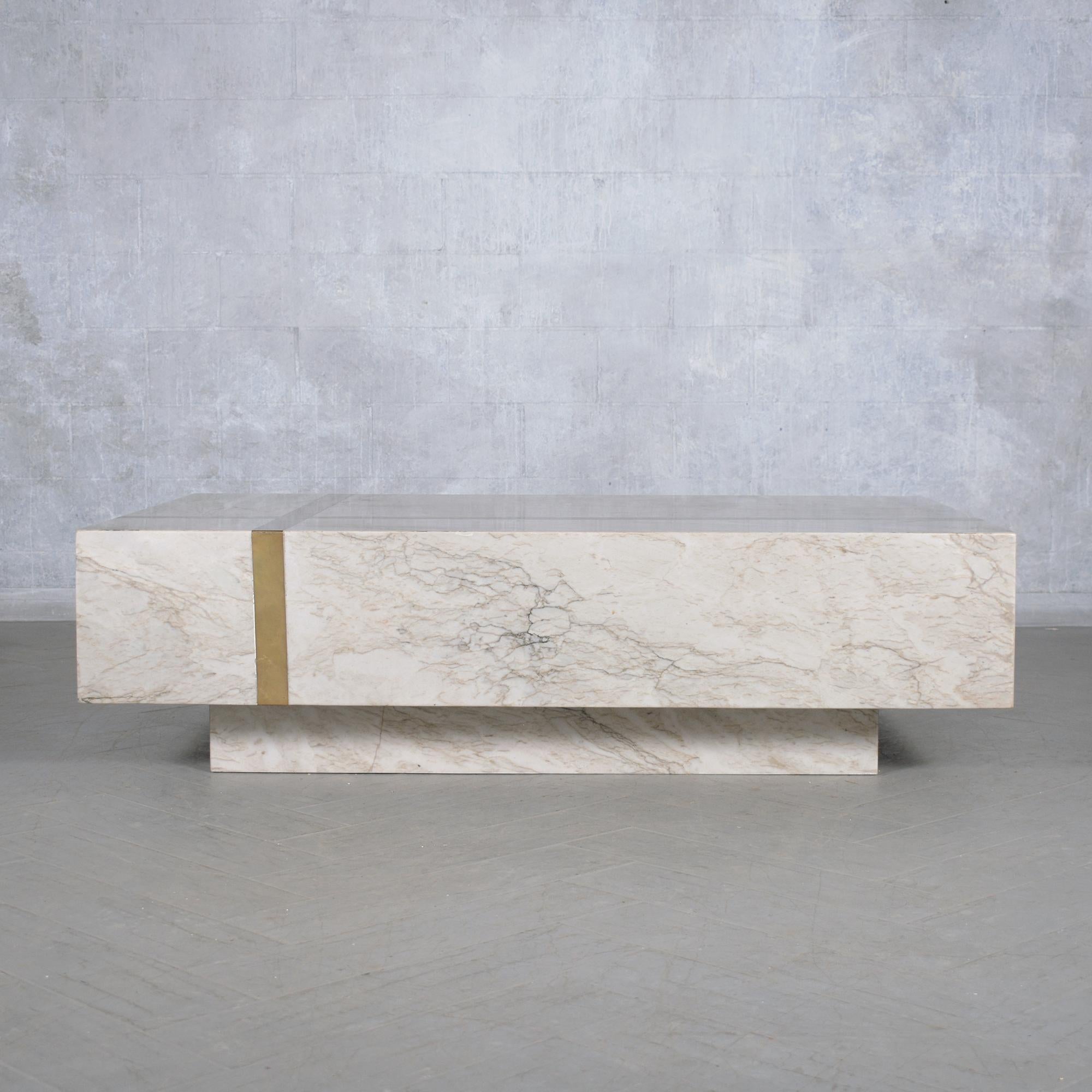 Explore the refined beauty of our Italian marble cocktail table, masterfully restored by our skilled craftsmen to showcase its original magnificence. This exquisite table features a large square tabletop that embodies the classic principles of