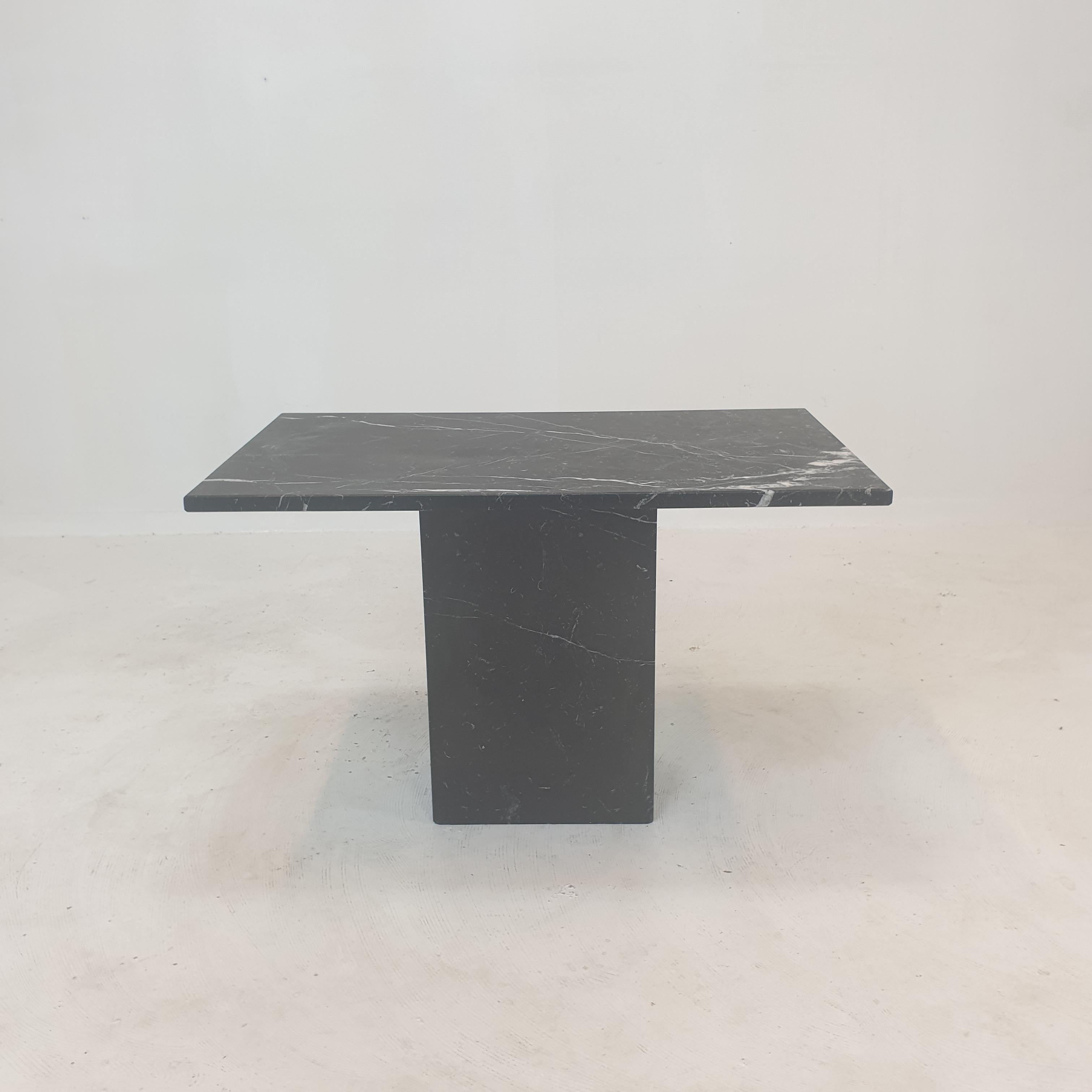 A very beautiful Italian coffee or side table handcrafted out of marble in the 80's.
The fabulous black marble features a beautiful pattern. 

We work with professional packers and shippers, we ship worldwide.
 