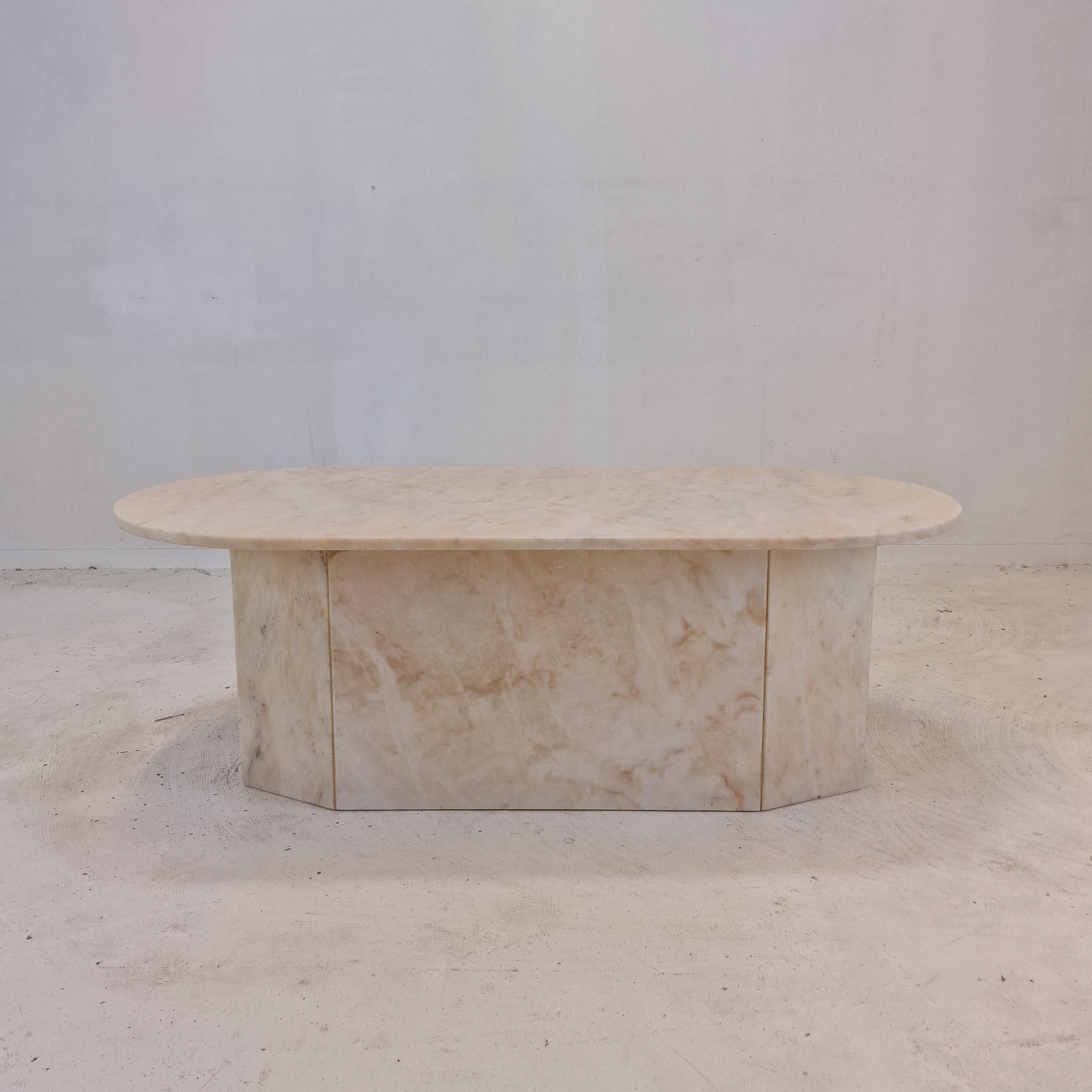 Very nice Italian coffee table, fabricated in the early 1980s.

It is handcrafted out of very beautiful marble.
The fabulous marble features a very nice pattern of different colors. 

It has the normal traces of use, see the pictures. 

We work with