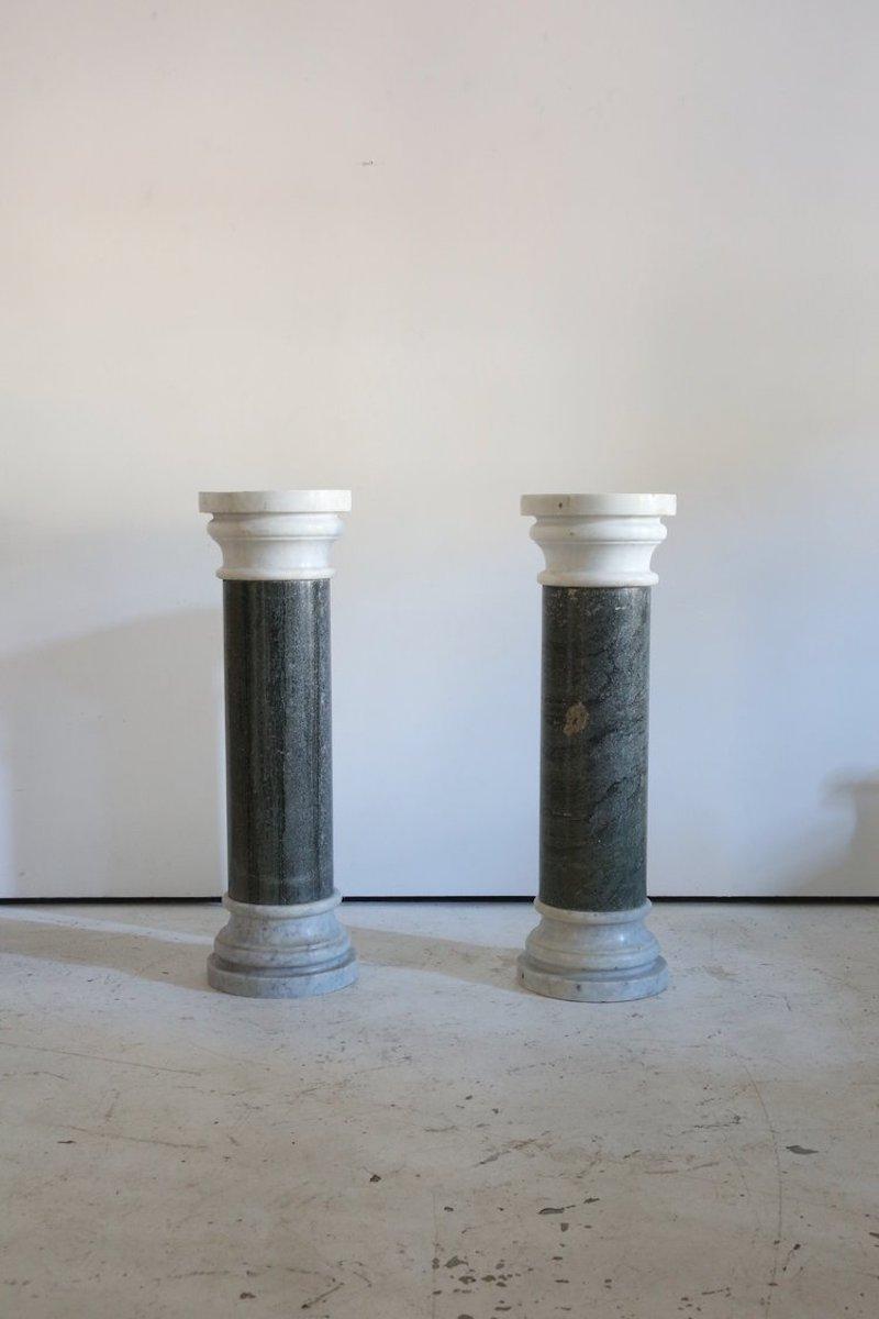 Impressive Neo classical column plinths in solid marble. 

Made up of three sections, all carved from different types of marble.

Once used in the lobby of well-known design led Hotel in Central London. 

Can be sold together or individually. Priced