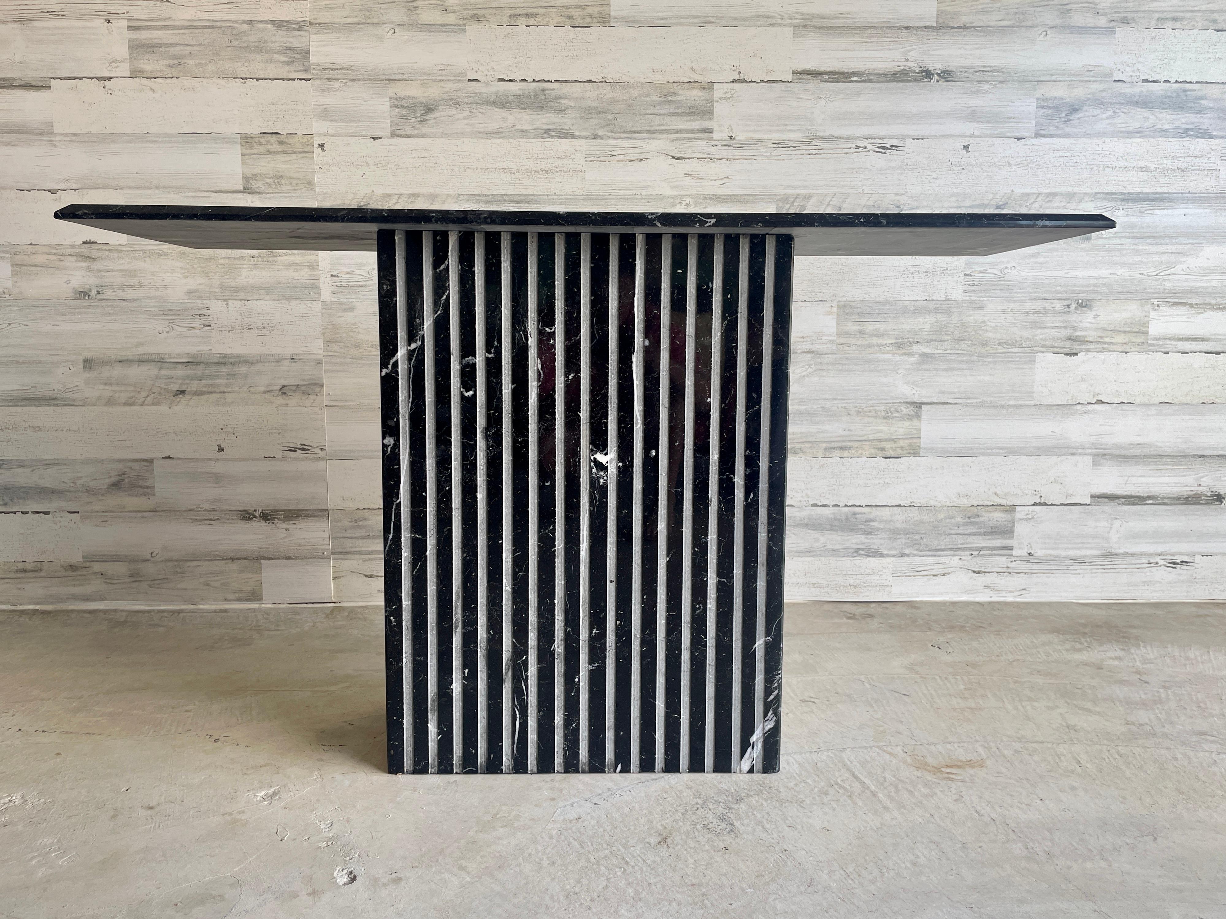 Italian Black and White Marble Console Table. Very unique ribbed base. Original 