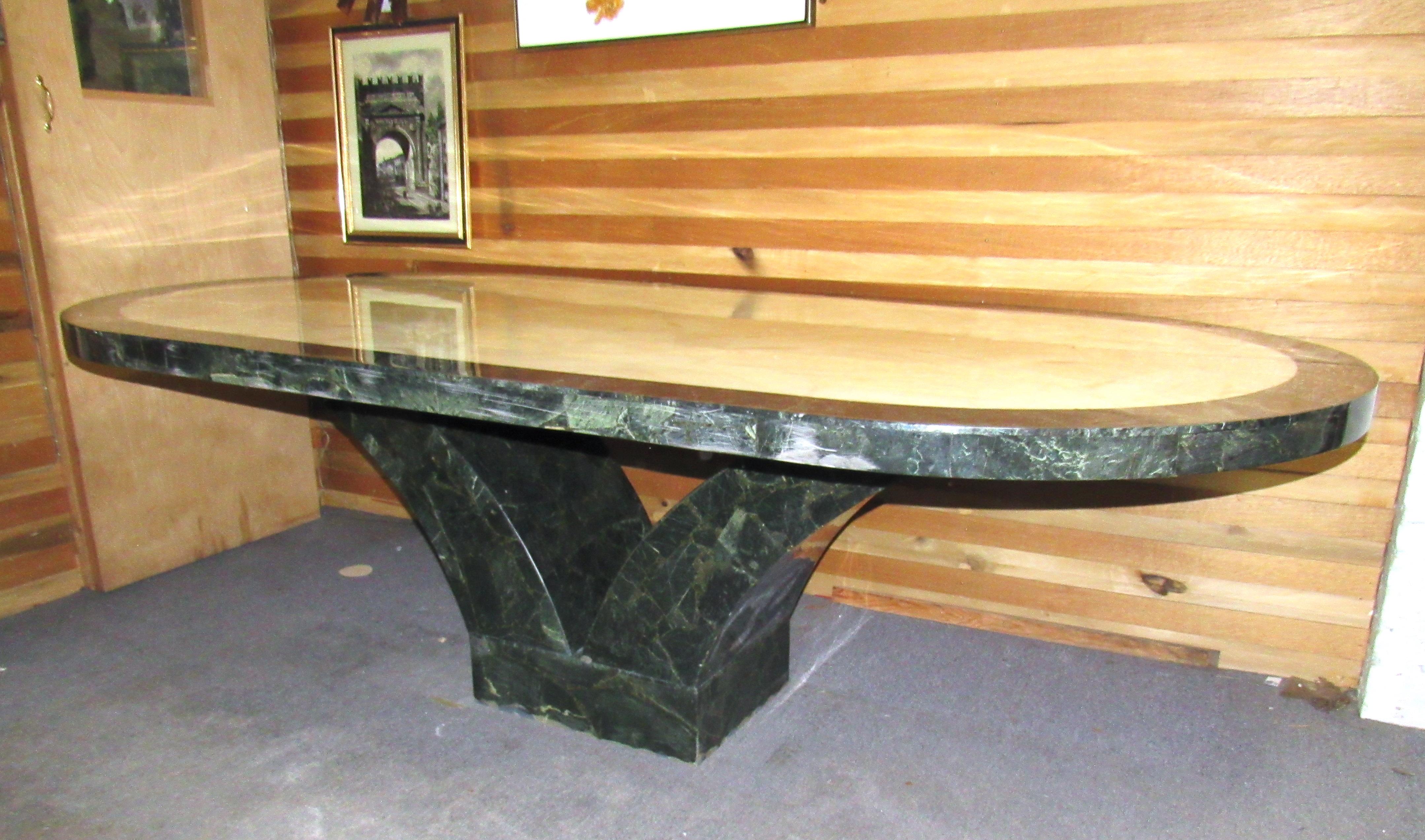 This large Mexican marble dining or conference pedestal table is a 1970's modern piece that makes a bold statement in any home or office. Top table rests on the base.
Location: Brooklyn NY